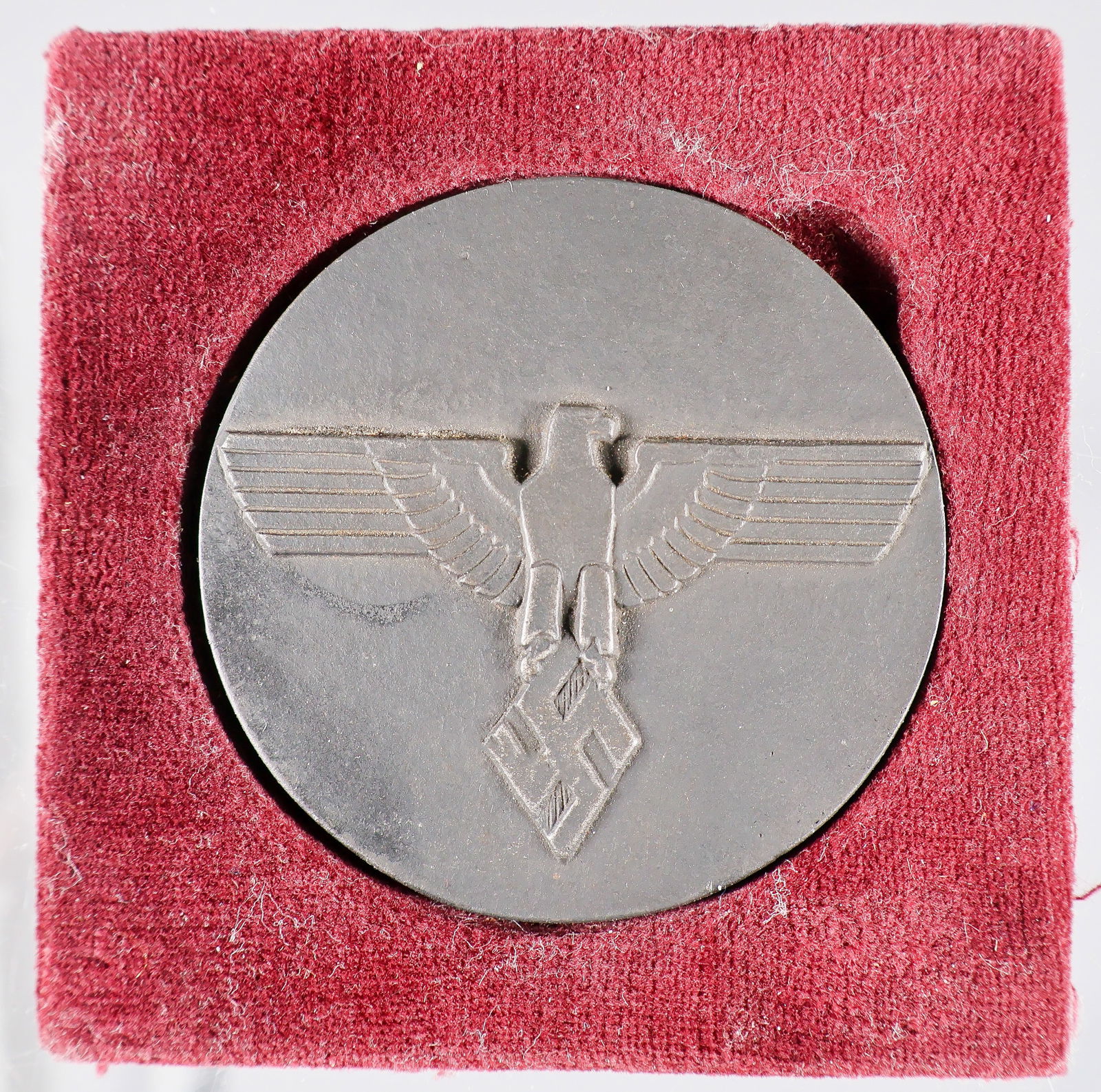 HITLER YOUTH CHAMPIONSHIPS MEDALLION, 1938: Table medal awarded to certain members of the Hitler Youth, cast iron 2.25 in. dia., the obverse displaying a spread-winged eagle clutching the diamond-shaped swastika emblem of the Hitler Youth, the