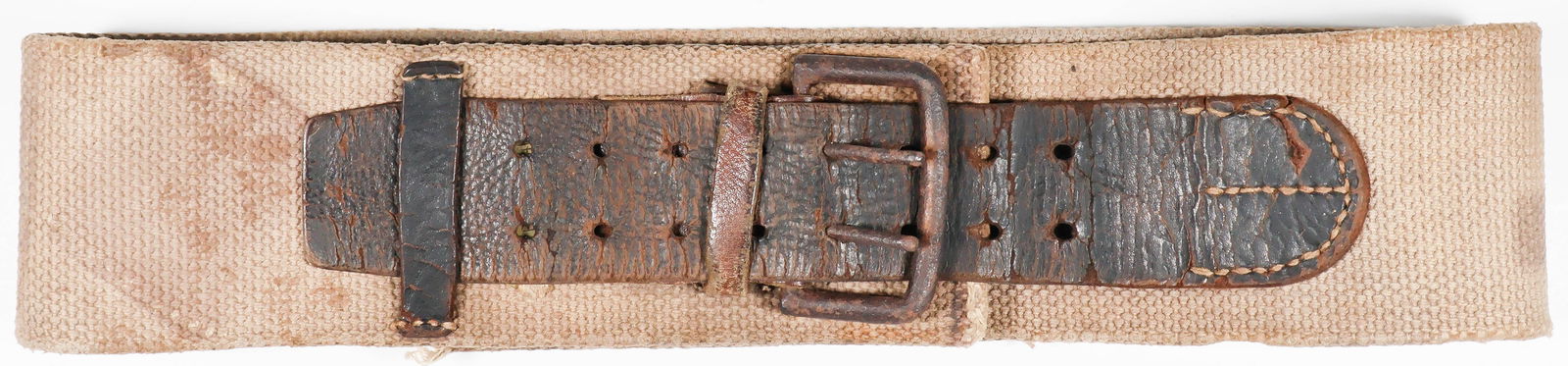 JAPANESE SERVICE SWORD BELT WITH IDENTIFICATION DISC: Quite rare Japanese army officer's service sword belt, heavy canvas and leather construction 37 in. long overall, 3 in. wide with two-pronged buckle and matching leather belt. Sewn to the belt is the