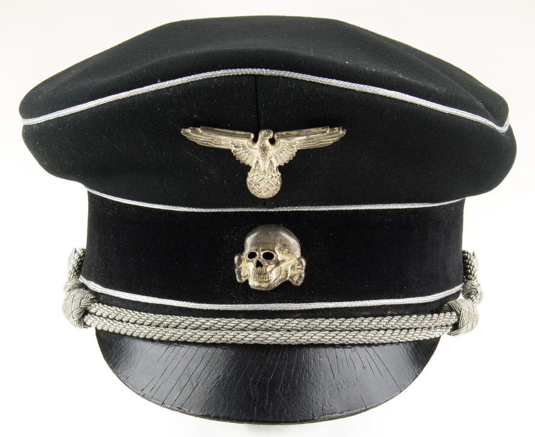 ALLGEMEINE-SS GENERAL'S 'CRUSHER' STYLE VISOR CAP: An excessively rare Allgemeine-SS General's 'Crusher'-type Visor Cap. This cap is constructed of comparatively heavy-weight black wool with a black felt side band. Two bands of silver metal piping