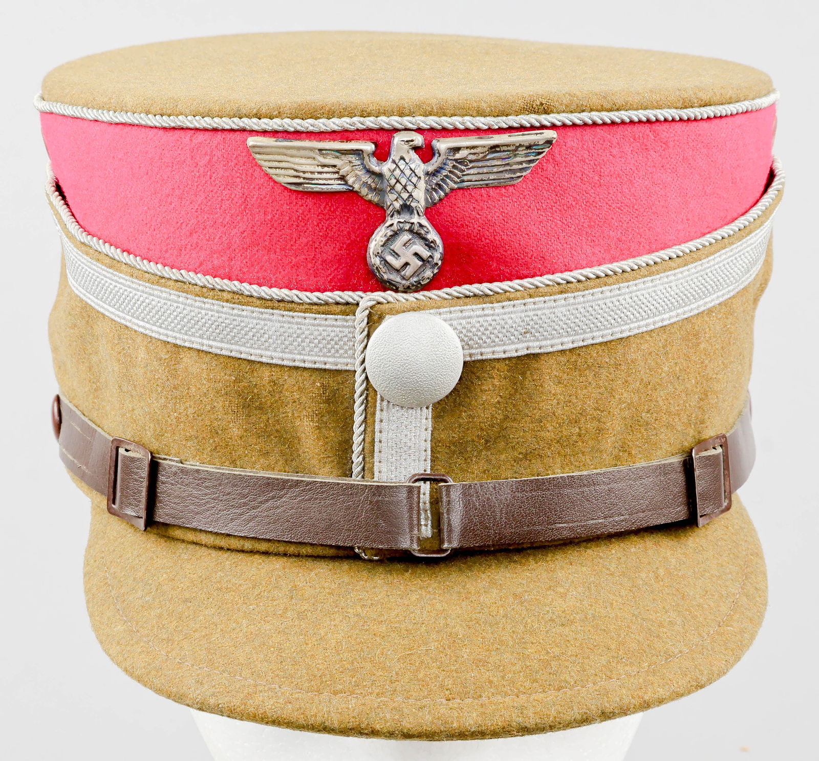 SA-STANDARTE ‘FEDLHERRNHALLE’ STANDARTENFUHRER’S CAP: An extremely rare ‘coffee-can’-style cap or kepi worn by a member of the SA-Standarte ‘Feldherrnhalle’, the honor guards of the NSDAP-Ehrenmal at the Feldherrnhalle in Munich,