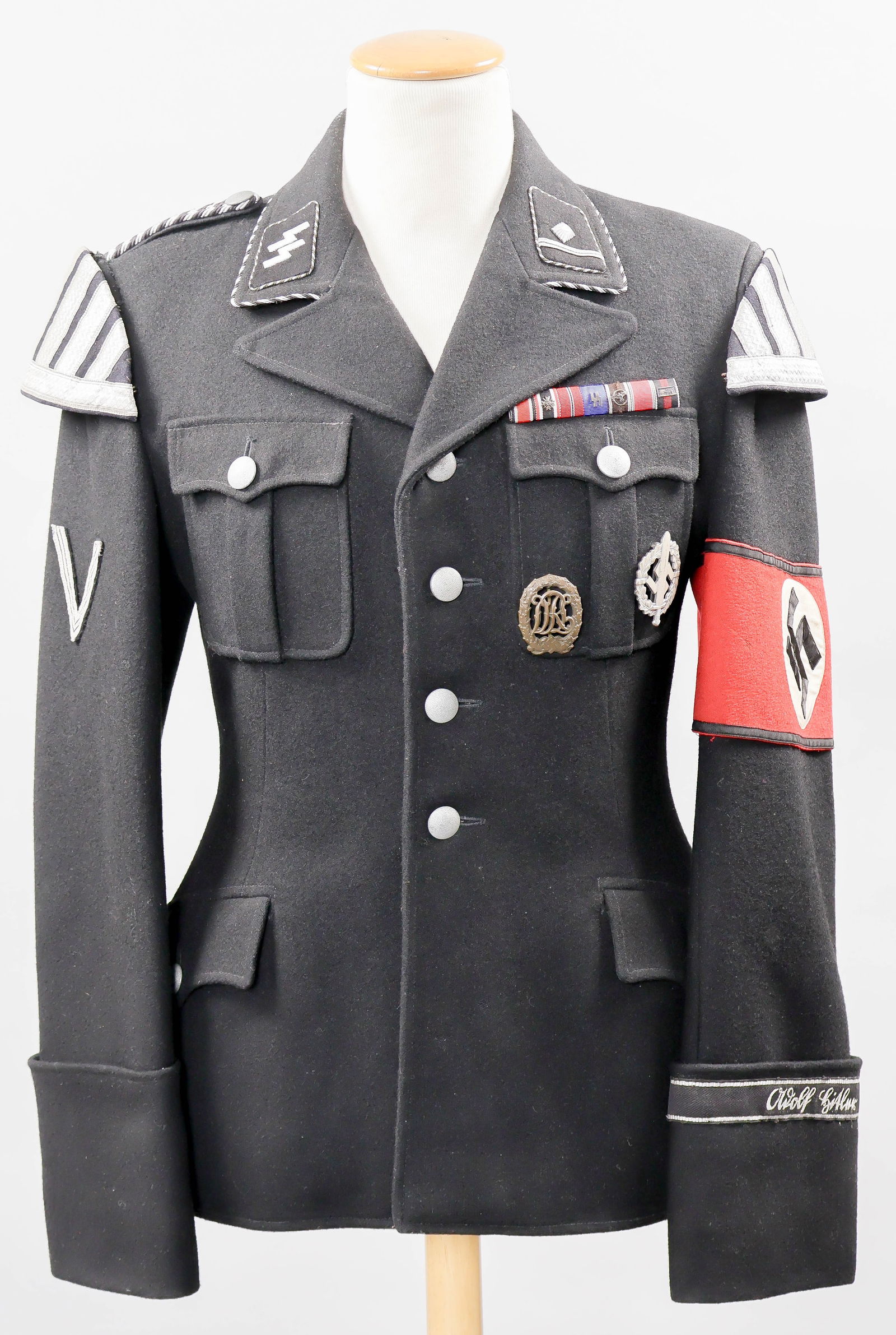 LIEBSTANDARTE ALLGEMEINE-SS MUSICIAN'S TUNIC: Excessively rare Liebstandarte-SS Musician's Tunic, in superb condition, with signed analysis by famous SS collector David L. Delich and certificate of authenticity by History Hunter/Craig Gottlieb.