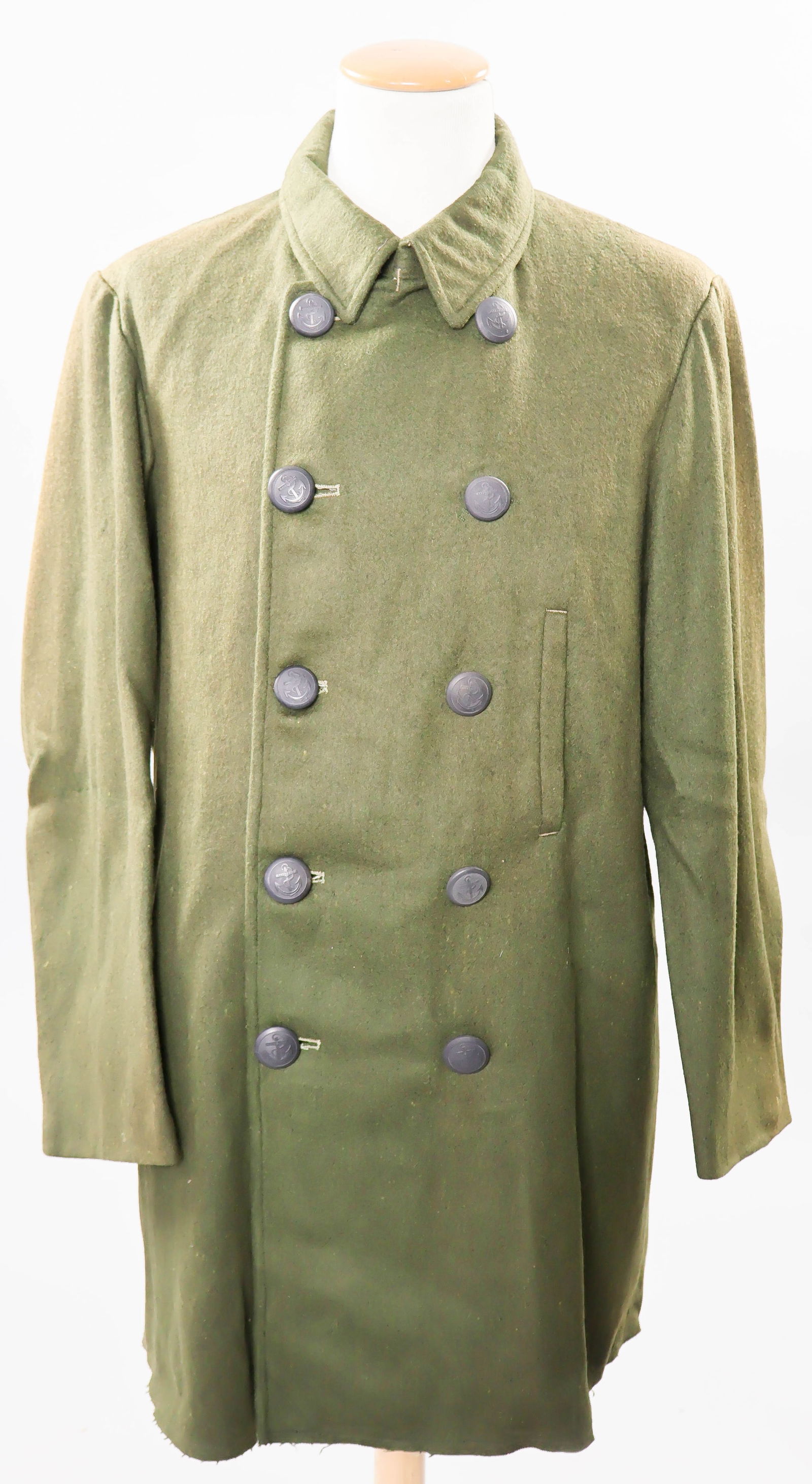 JAPANESE NAVY WOOL PEACOAT: Full length Japanese Navy peacoat, green wool double-breasted construction with ten IJN black fouled anchor buttons and a blank maker's tag sewn at the neckline. Lined, though not very heavily,