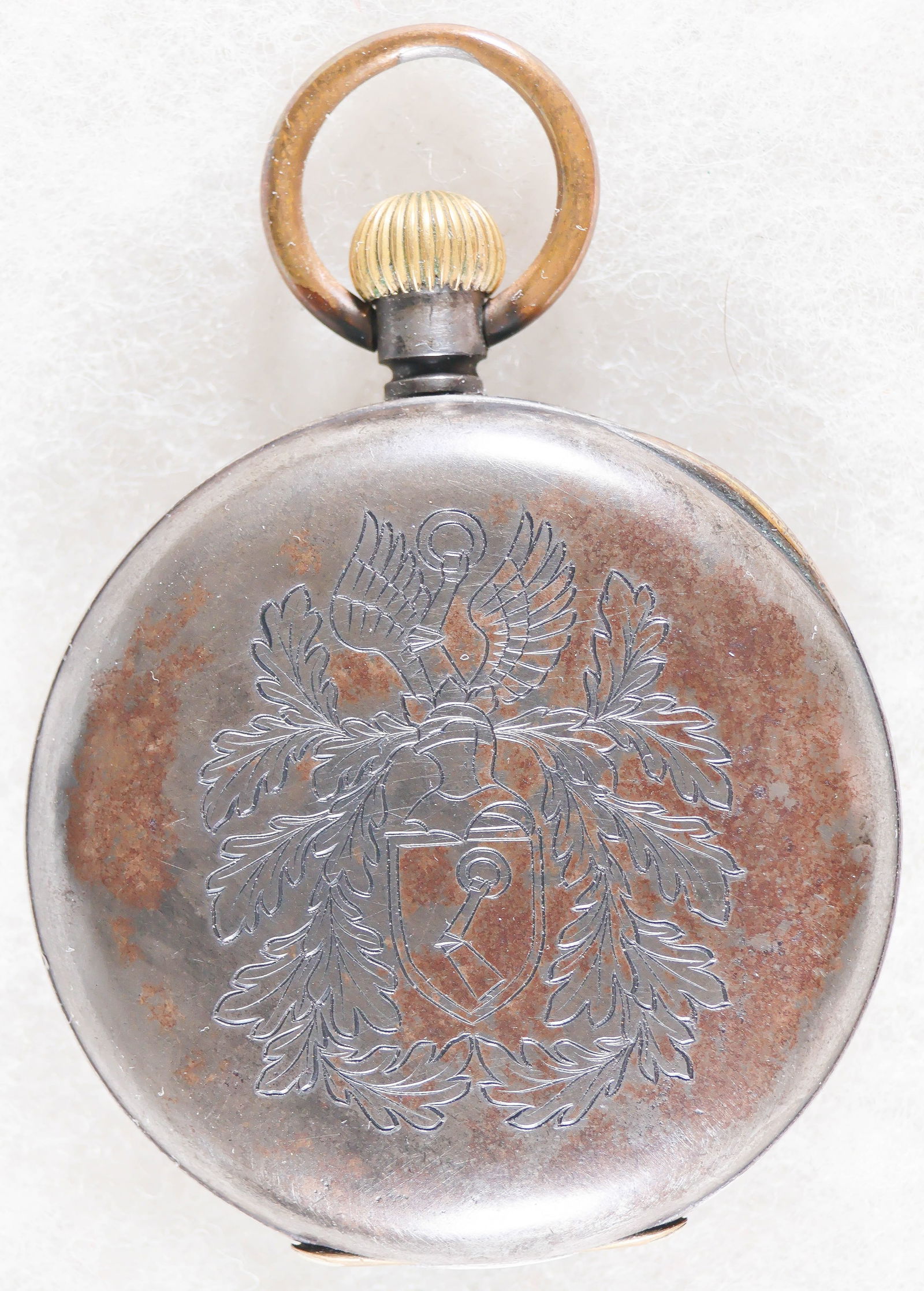OMEGA POCKET WATCH ATTRIBUTED TO HERMANN GORING AND WITH HIS COAT OF ARMS: An intriguing piece, a porcelain dial Omega pocket watch with Roman numerals and a sweep second dial at bottom, 1 7/8 in. dia., movement serial no. 5,555,193 and likely manufactured around