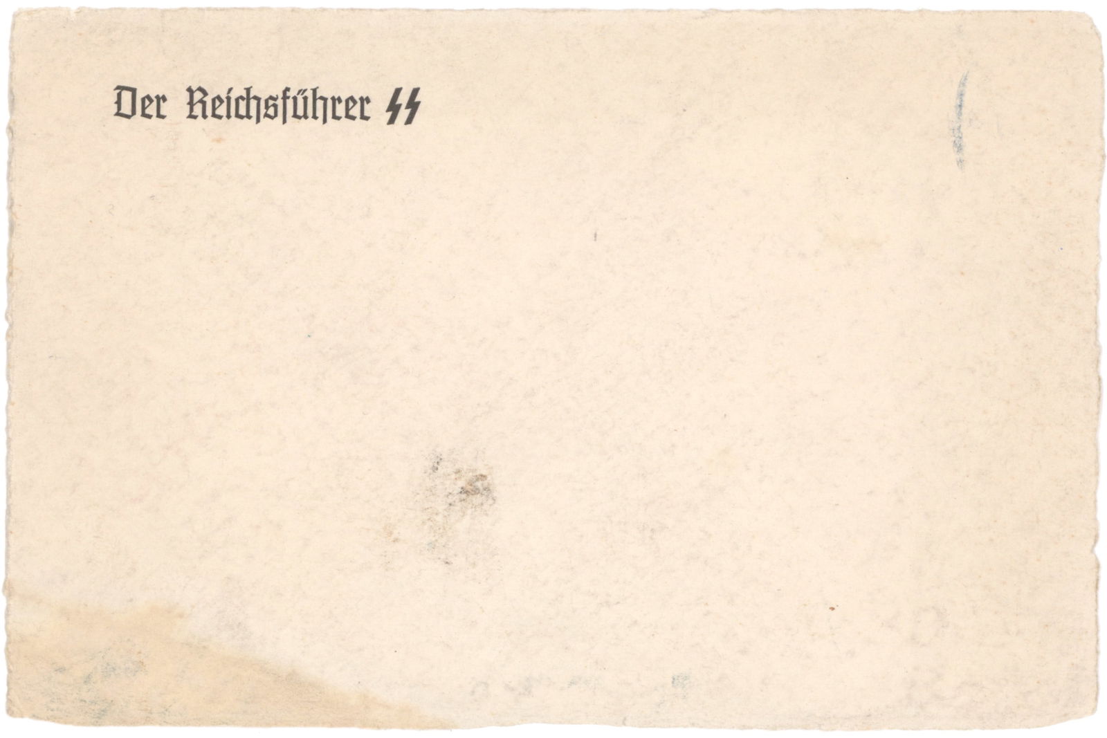 HEINRICH HIMMLER'S CORRESPONDENCE CARD: An unused correspondence card once belonging to Reichsfuhrer-SS Heinrich Himmler, quality cotton rag paper 6.75 x 4.5 in., printed at top: 'Reichsfuhrer-SS'. Stained at lower-left corner, some