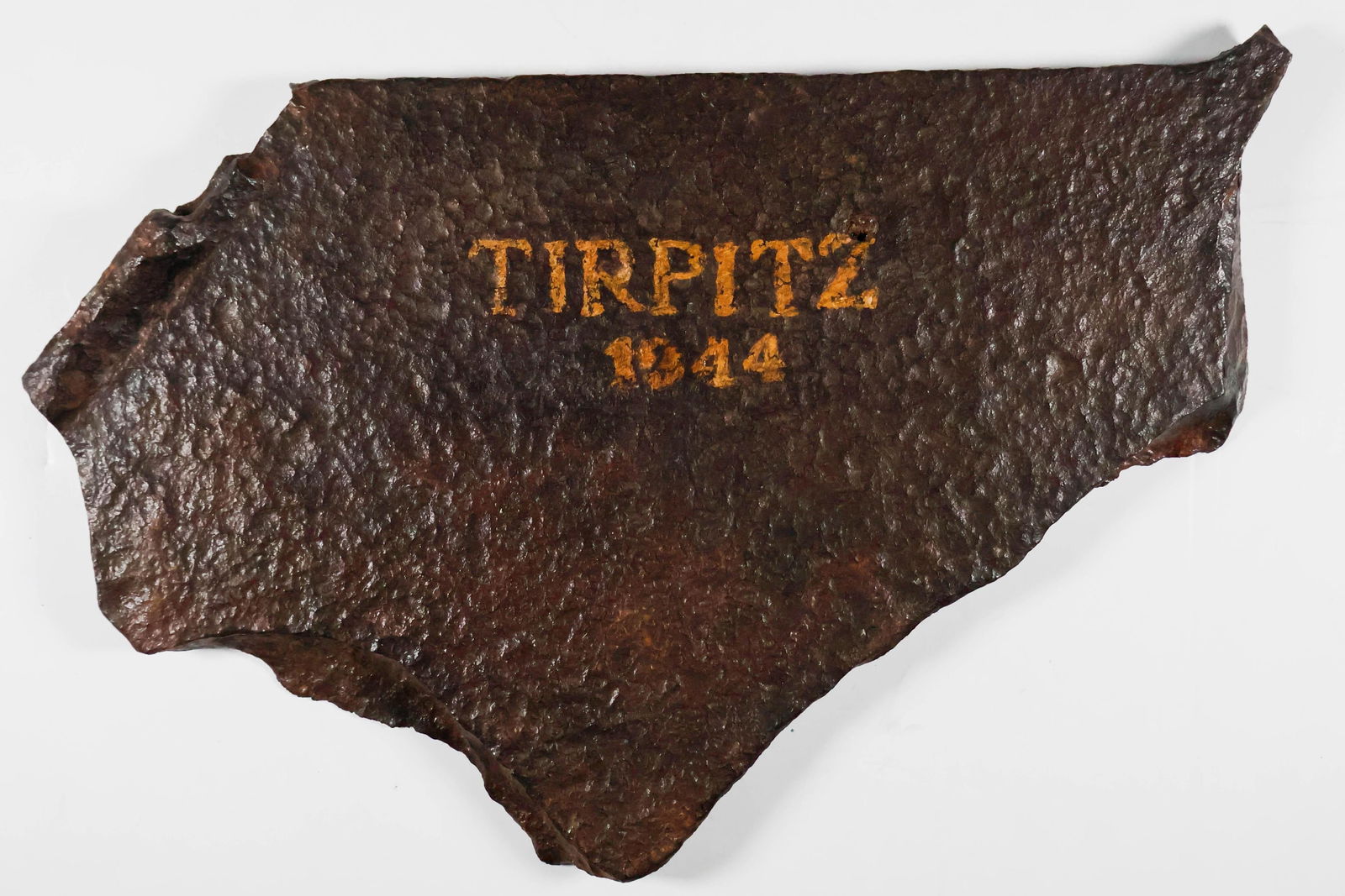 ARMOR PLATING FROM THE GERMAN BATTLESHIP TIRPITZ: Great armor relic recovered from the wreck of the German battleship TIRPITZ, sister to the infamous BISMARCK, sunk by Royal Air Force bombers off Norway in November in 1944. The armor, probably taken
