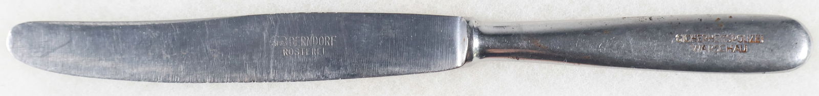 THIRD REICH POLICE SIPO MARKED BUTTER KNIFE: An interesting piece relating to the occupation of Poland, measuring 9.25 in., a butter knife made specifically for the Sicherheitspolizei, or SiPo, which worked under the Gestapo. It also features a