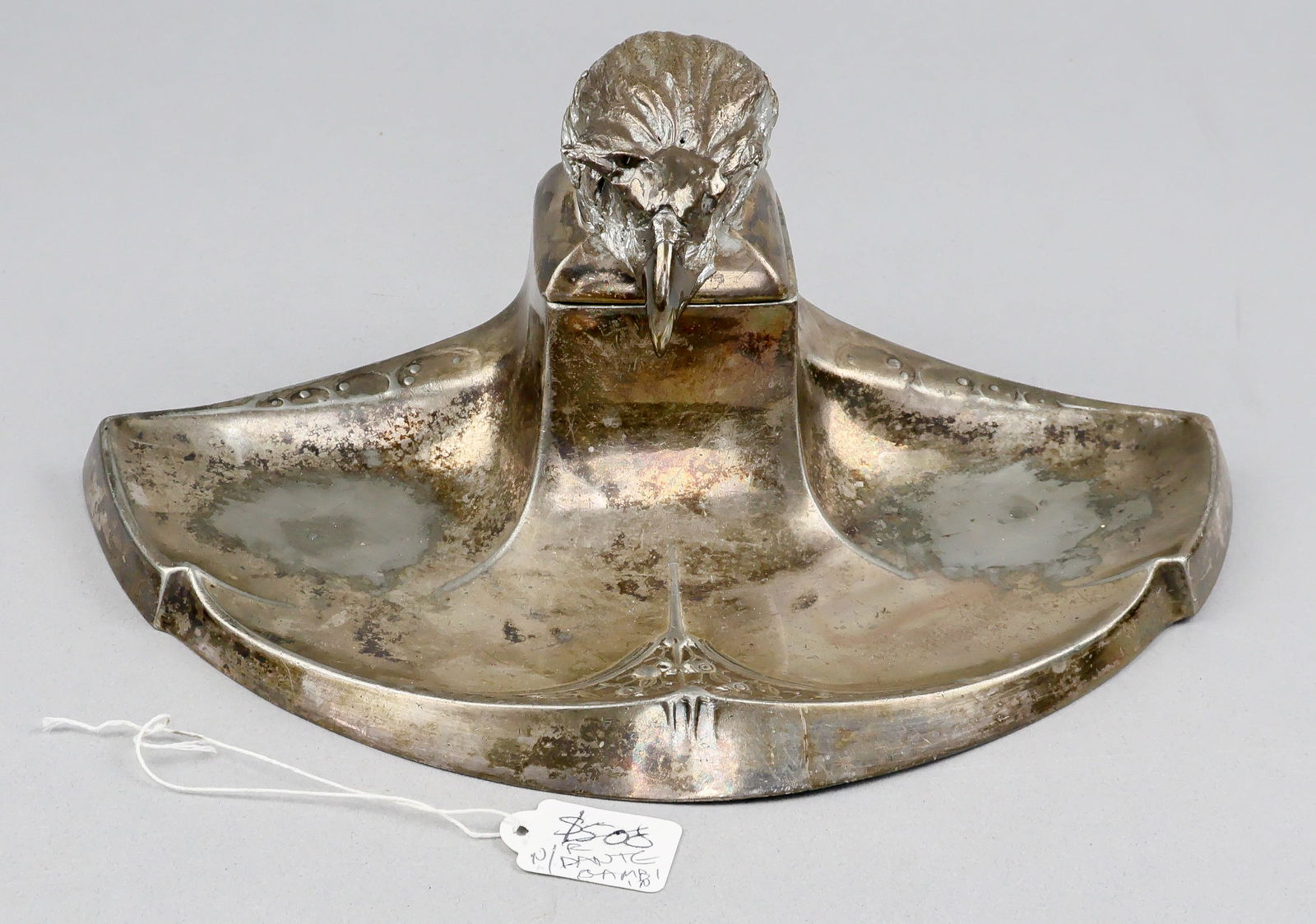 THIRD REICH SILVER EAGLE HEAD DESK SET: A silver-plated Jugendstil-style inkwell and tray set, 10 in. wide x 3.5 in. tall, marked with WaAmt styled, yet unnumbered, eagle stamp. Glass insert not present. Multi-piece eagle's head has been