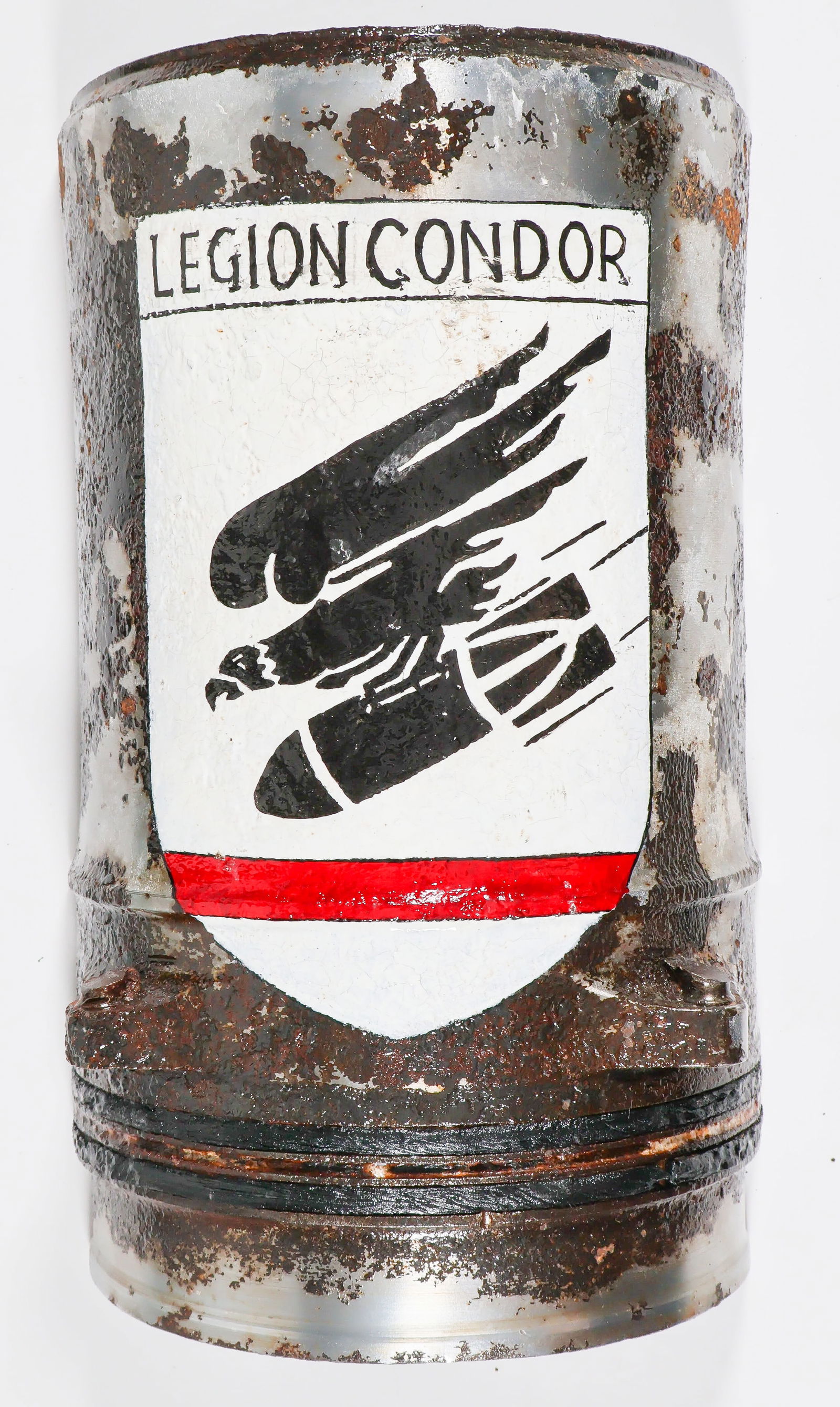 HE-111 PISTON SLEEVE: He-111 piston half sleeve, 10.5 in. long, steel construction and with heavy corrosion in places indicating 'dug' condition. At some point recently, a vandal painted a Condor Legion emblem on the