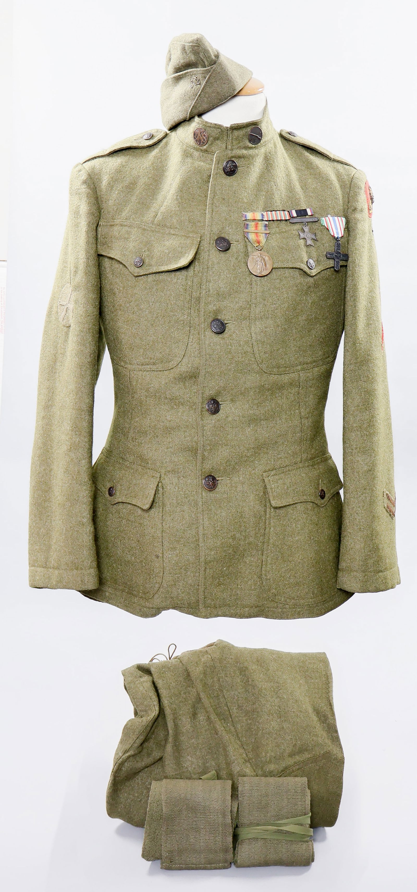 332ND INFANTRY REGIMENT ITALIAN SERVICE UNIFORM: An extremely fine uniform grouping belonging to a soldier of the U.S Army’s 332nd Infantry Regiment, which took part in the Vittorio Veneto offensive of 1918, helping to defeat the opposing Aust