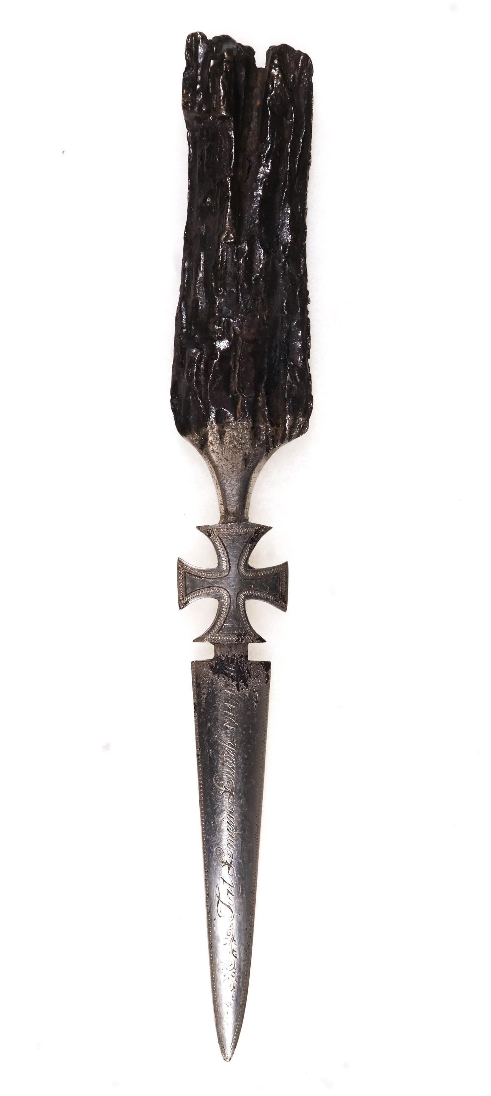 GERMAN SHRAPNEL TRENCH ART FROM FORT DE LONCIN: A very fine piece of World War I German trench art, a 9.5 in. piece of1 ragged shrapnel forged into a letter opener. Although a rather common practice during the war, this specimen is special - it