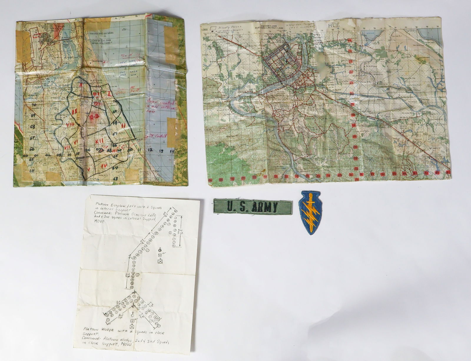ARMY SPECIAL FORCES BATTLE MAPS OF HUE AND DANANG (5): Exceptional lot of four Vietnam War items obtained from a U.S. Army Special Forces veteran of that conflict including three battle maps and two pieces of insignia. One map, 17.5 x 12 in., is headed 'H