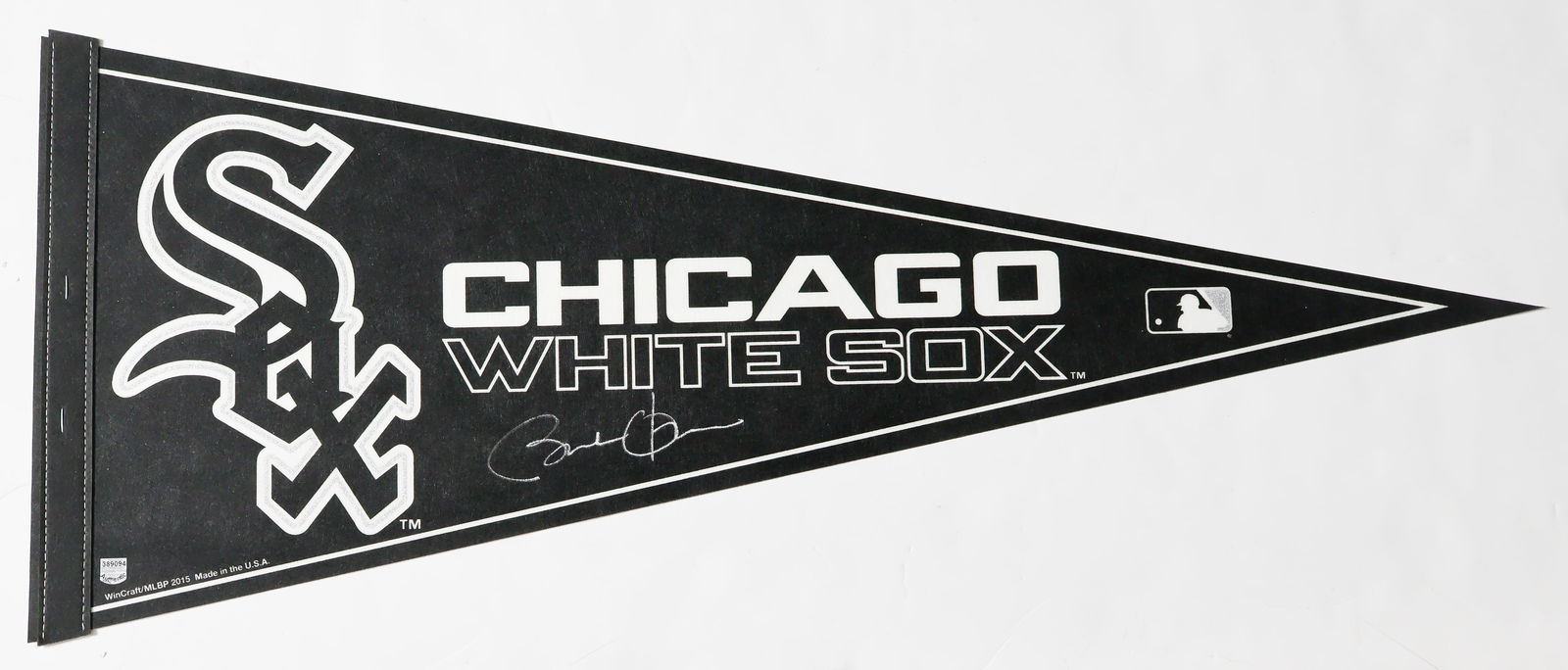 BARACK H. OBAMA, JR.: (b. 1961) 44th President of the United States, and the first African American to hold the office. Fine black and white felt Chicago White Sox pennant with logo, 12 x 30 in., signed by Obama at bottom