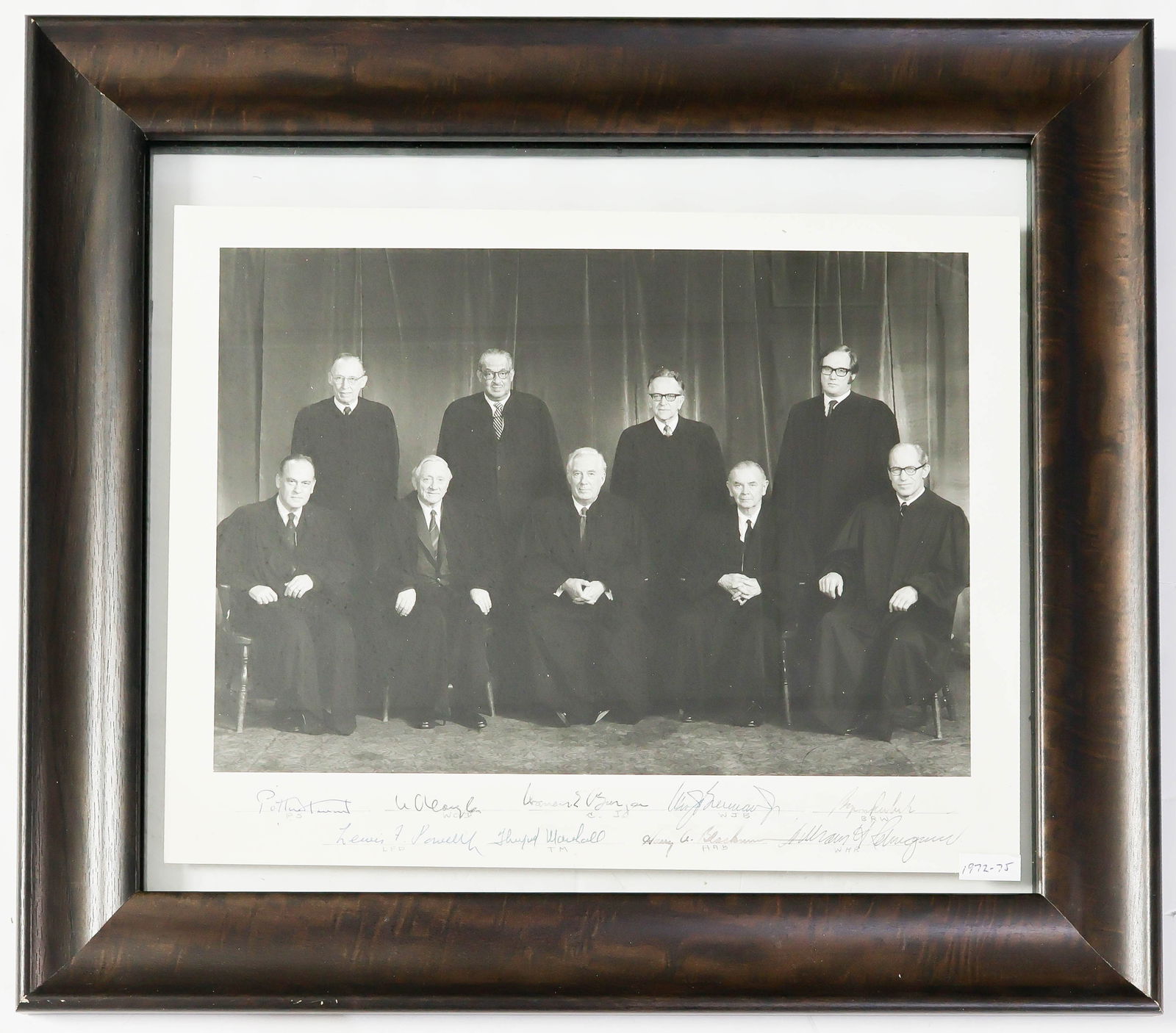 1972-75 WARREN E. BURGER U.S. SUPREME COURT: Very desirable signed formal photograph of the entire Warren Burger U.S. Supreme Court, ca. 1972-75. The 14 x 11 in. b/w image is signed in the white bottom margin by the nine members of the court,