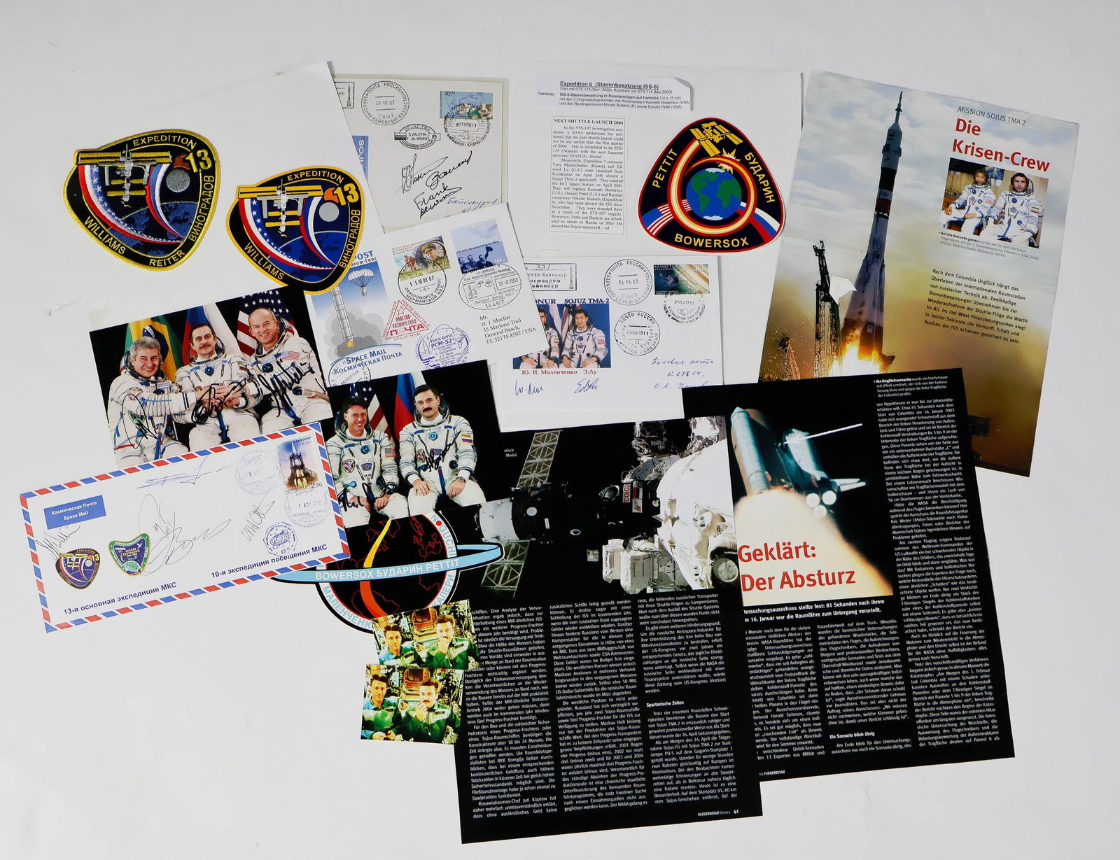 SOYUZ MISSION, 2002-2009: A collection of 19 commemorative covers and photographs honoring the Soyuz programs of the early 2000s, each signed by astronauts and cosmonauts participating in the missions. Signatures include: