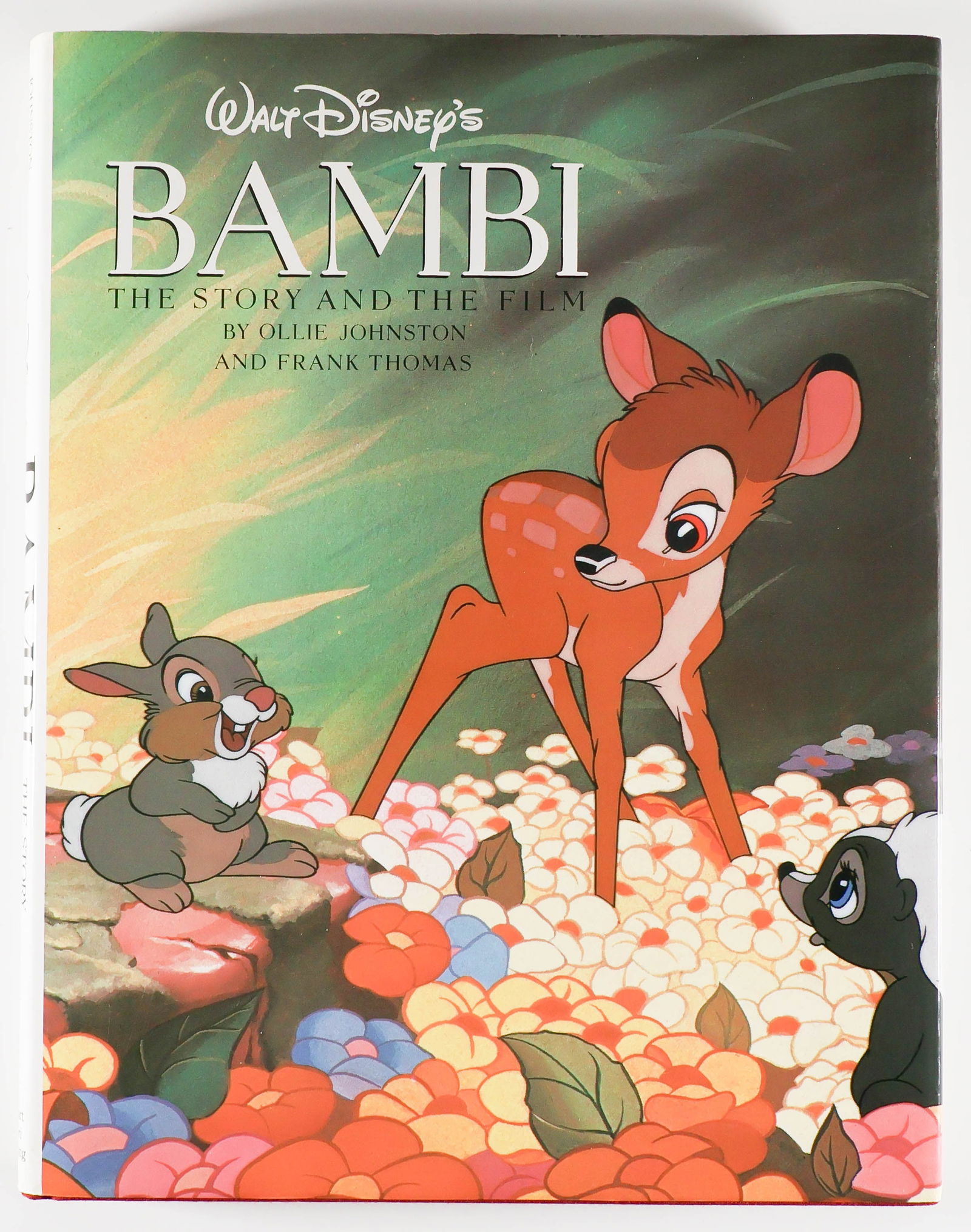 DISNEY ANIMATORS: Signed book: 'Bambi The Story and the Film' by Ollie Johnston and Frank Thomas (New York: Stewart, Tabori & Chank), 1990. 208pp. large 4to., probable first edition, in burgundy cloth with dust