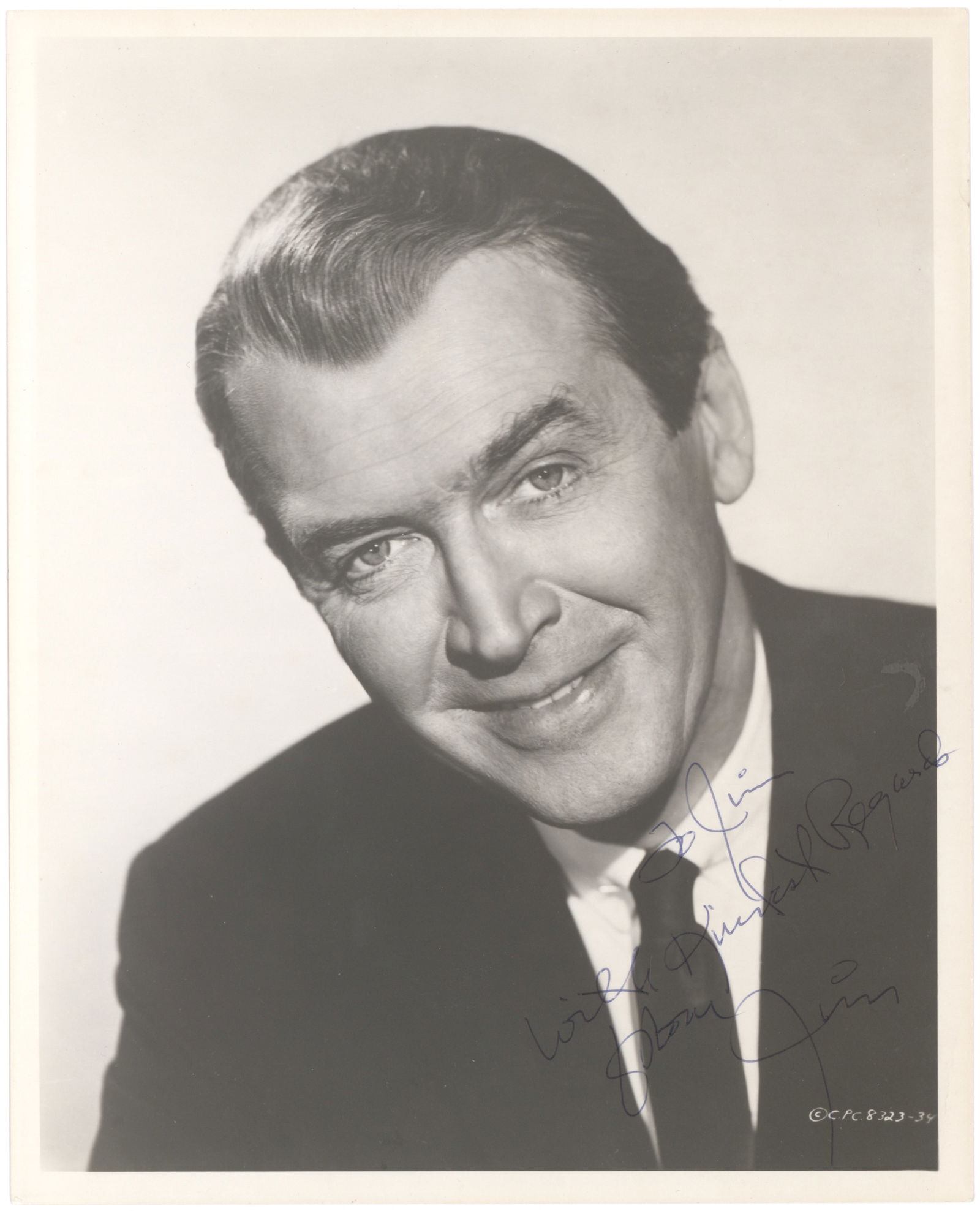JAMES STEWART: (1908 - 1997) American film actor, star of 'Harvey' and 'It's a Wonderful Life', among many others. Vintage I.S.P. 'Jim', 8 x 10 in. b/w, a great smiling portrait signed at lower-right. Fine.