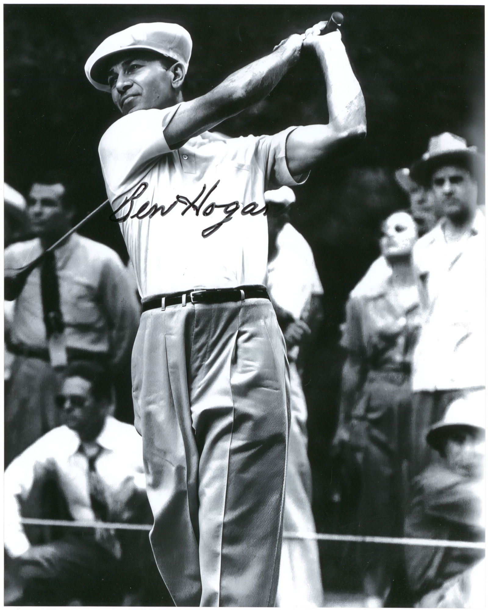 BEN HOGAN: (1912 - 1997) American golfer, four-time winner of the U.S. Open and twice winner of the Masters. S.P. 10 x 8 in. b/w, a reprint of a vintage showing Hogan mid-swing. Boldly signed at middle and fine.