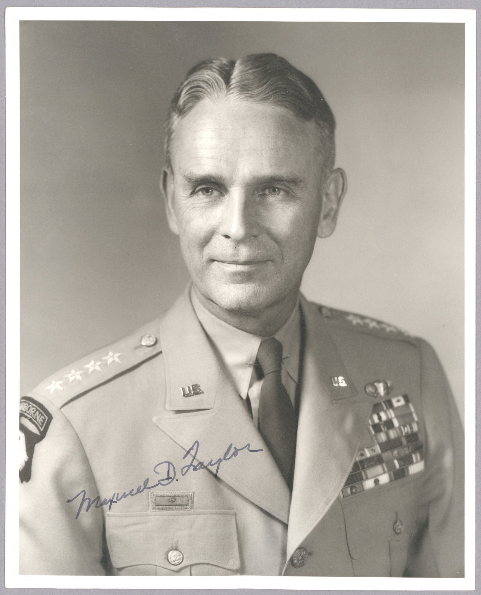 MAXWELL D. TAYLOR: (1901-1987) Senior United States Army officer and diplomat, served in World War II as Commander of 101st Airborne Division nicknamed 'The Screaming Eagles'. Superb vintage S.P. 8 x 10 in. matte b/w,