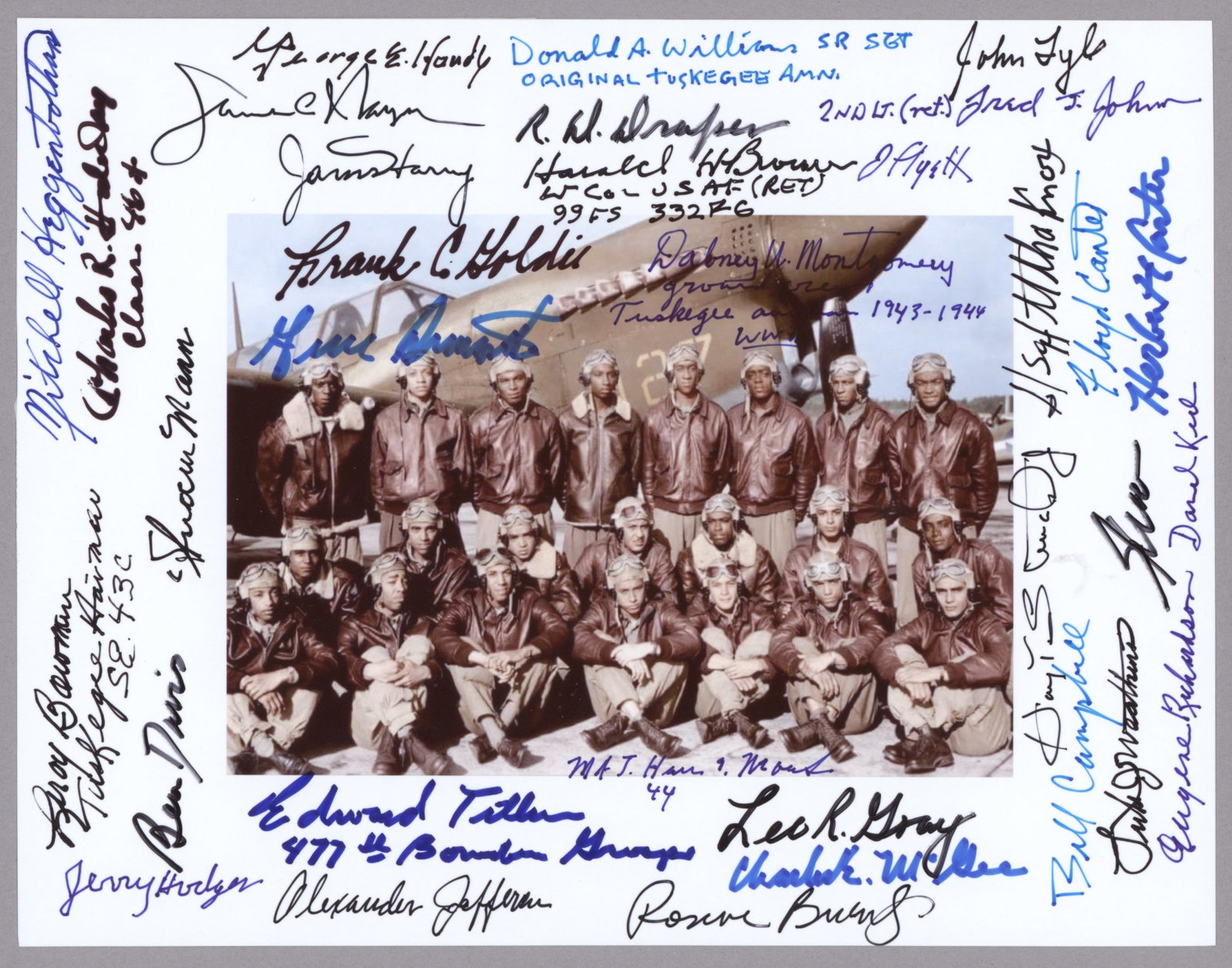 TUSKEGEE AIRMEN: Very fine S.P. 11 x 8.5 in. contemporary reprint of a vintage image signed by an incredible 33 crew members! Signatories include: GEORGE E. HANDY, DONALD A. WILLIAM, R. W. DRAPER, JOHN LYLE, FRED