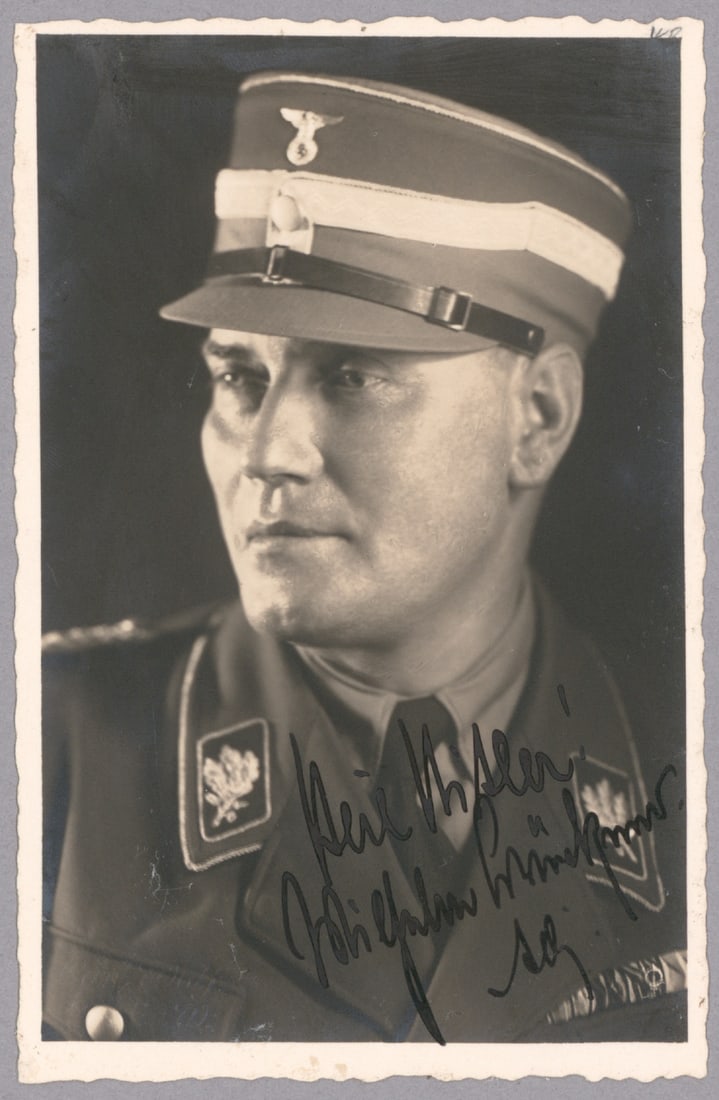 WILHELM BRUCKNER: (1884-1954) S.A. Obergruppenfuhrer and, until 1940, Hitler's Chief Adjutant and bodyguard; later a Wehrmacht colonel. Fine S.P. 3.5 x 5.5 in. b/w, a deckle-edged Wolff real-photo postcard showing Bruc