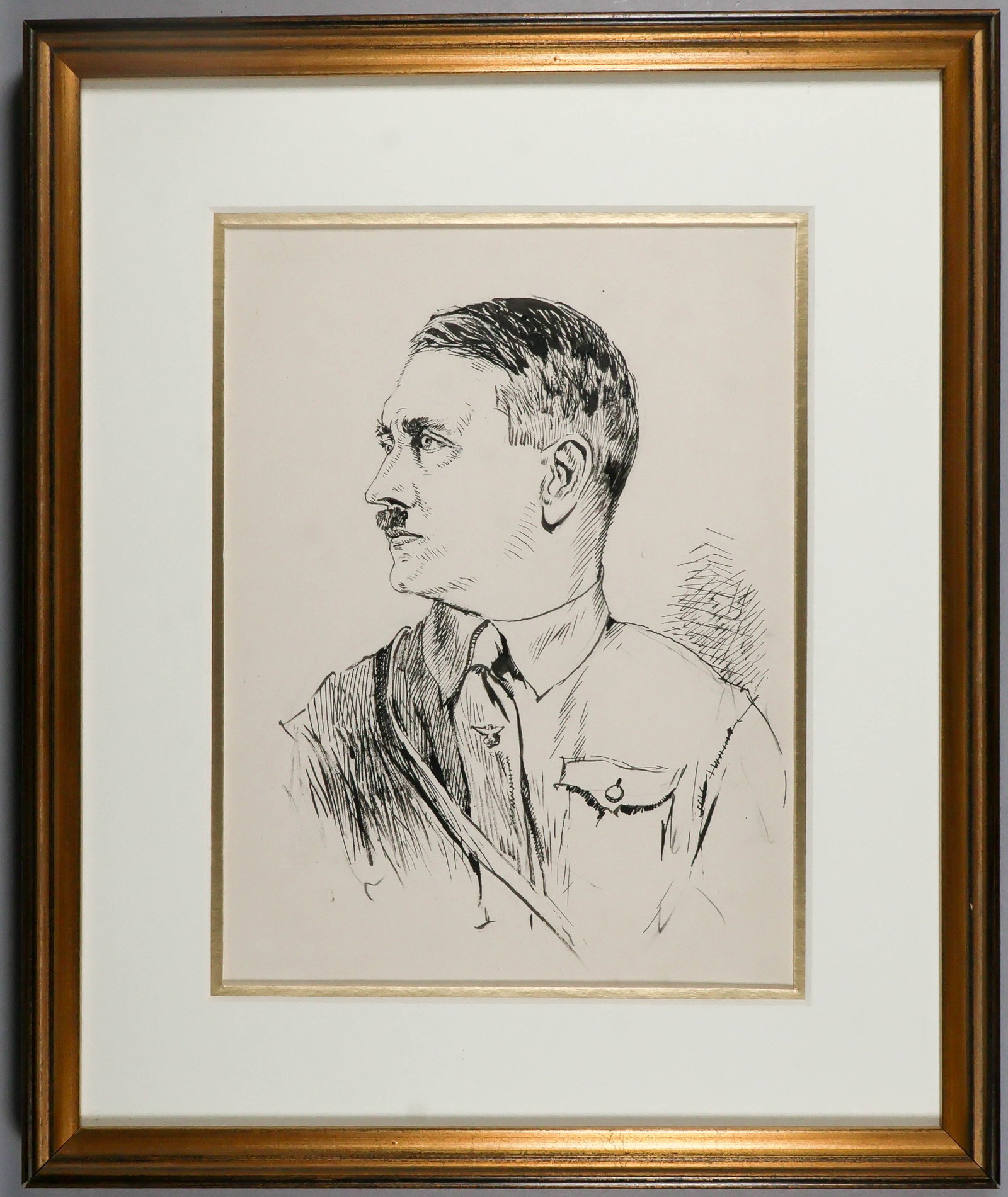 (ADOLF HITLER) ALBERT REICH: Original artist sketch in pen and ink of Adolf Hitler by the classically trained artist Albert Reich (1881-1942). This hand-drawn period ink sketch, 6.5 in. x 8.5 in. is framed in a modern gold frame 