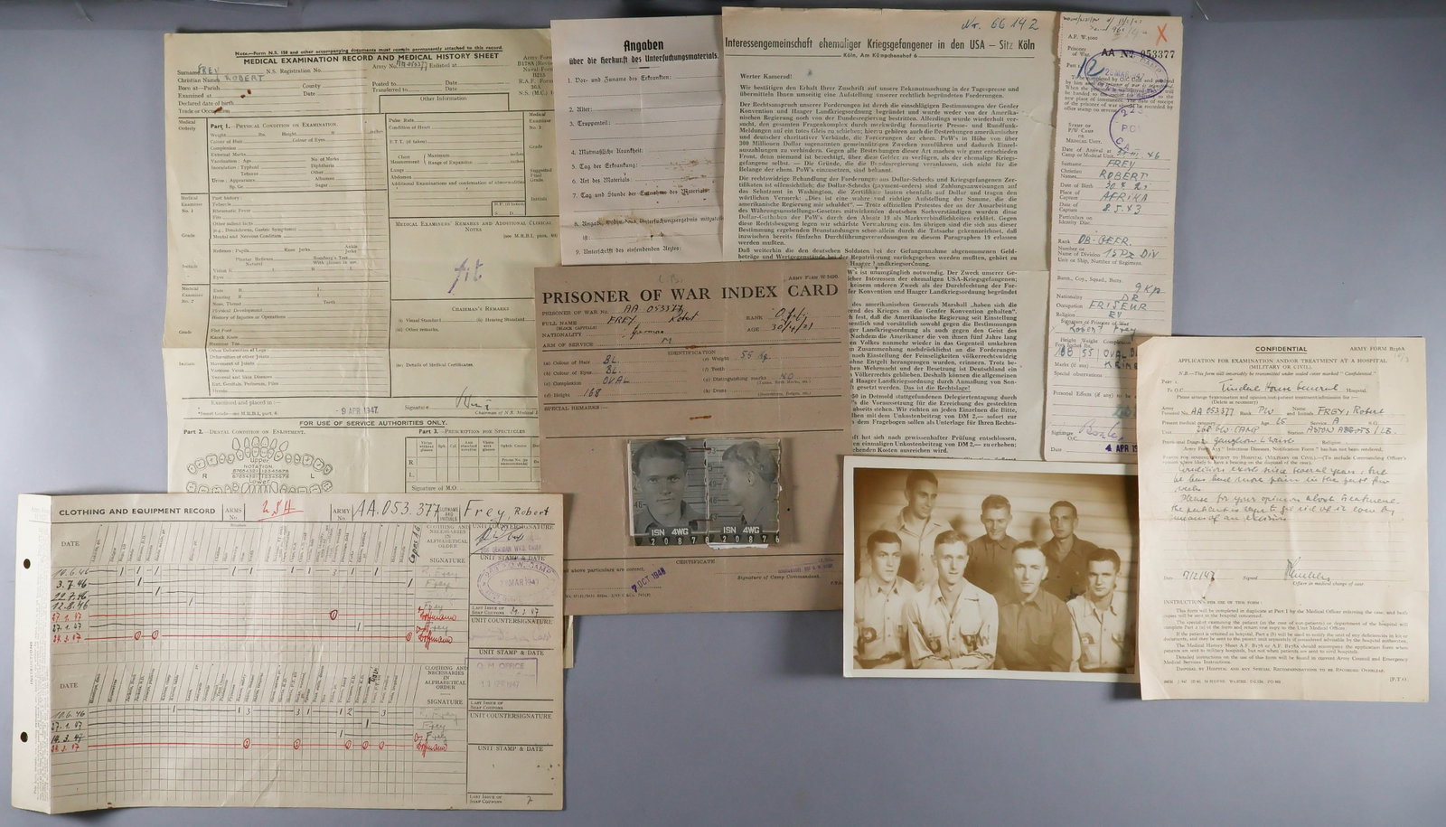 AFRIKAKORPS PANZER OBERGEFREITER P.O.W. DOSSIER: An interesting group of items related to Robert Frey, DB-GEFR, 15th Panzer Division, captured in Africa 8/05/1943. The lot includes: Frey’s POW transfer form with stamps showing his movement fro