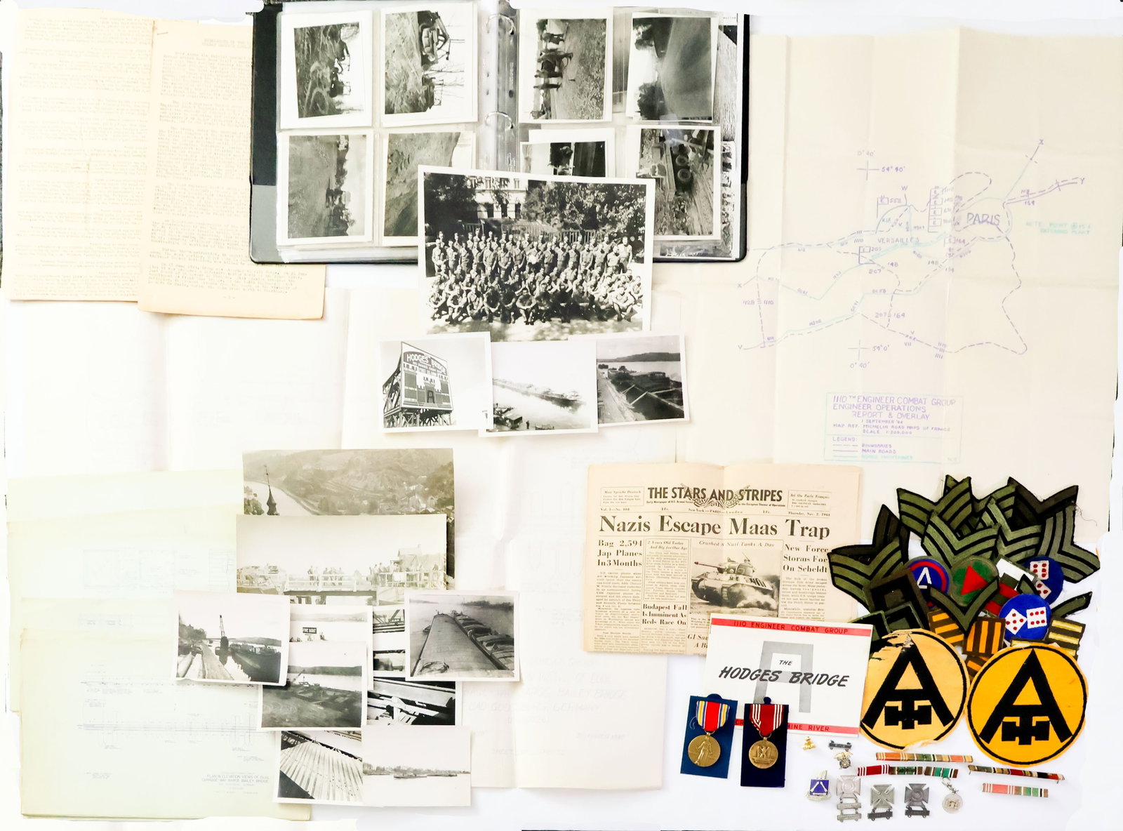 BUILDING THE HODGES RHINE BRIDGE AT BAD GODESBERG: An important grouping of maps, documents and insignia from U.S. Sergeant of Engineers Rodney O. Brown with the 1110 Engineer Combat Group closely and associated with the construction of the crucial 'D