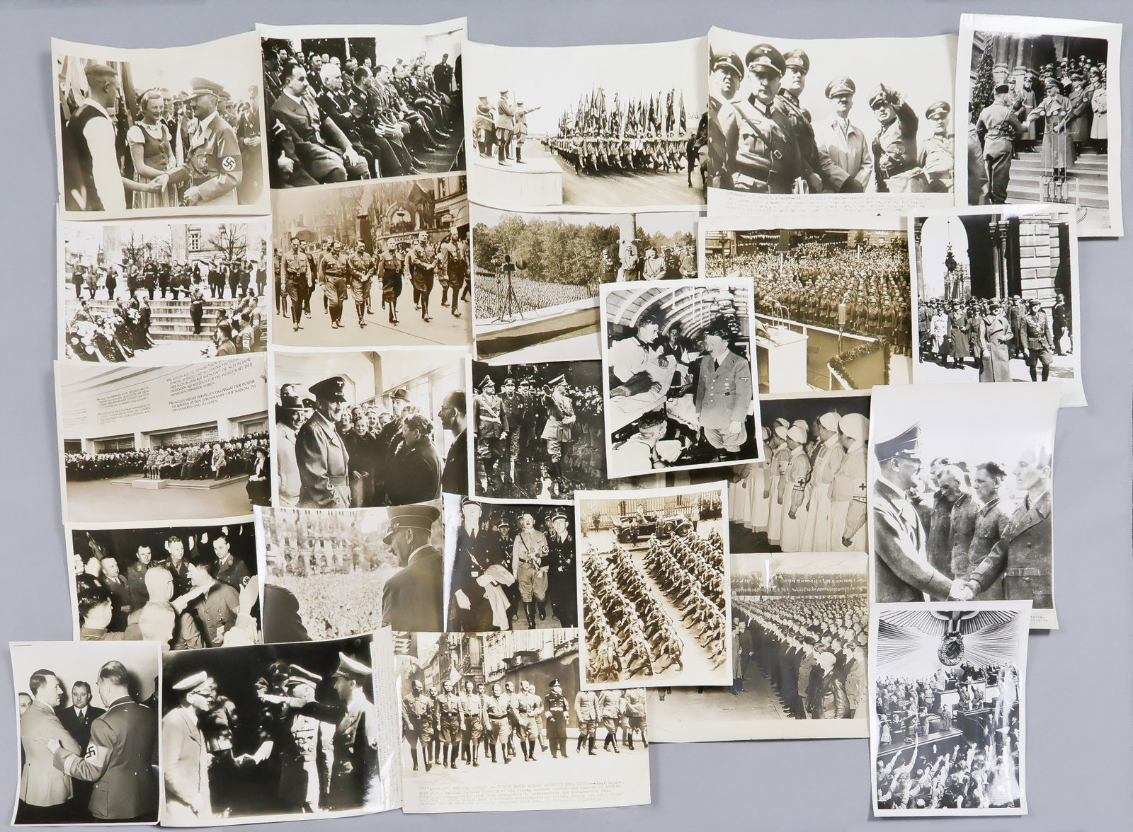ADOLF HITLER (25): Good lot of 25 period press photographs, average size about 7 x 9 in. and the great majority with period date and/or press affiliation ink stamps on verso, a good representative selection of varying