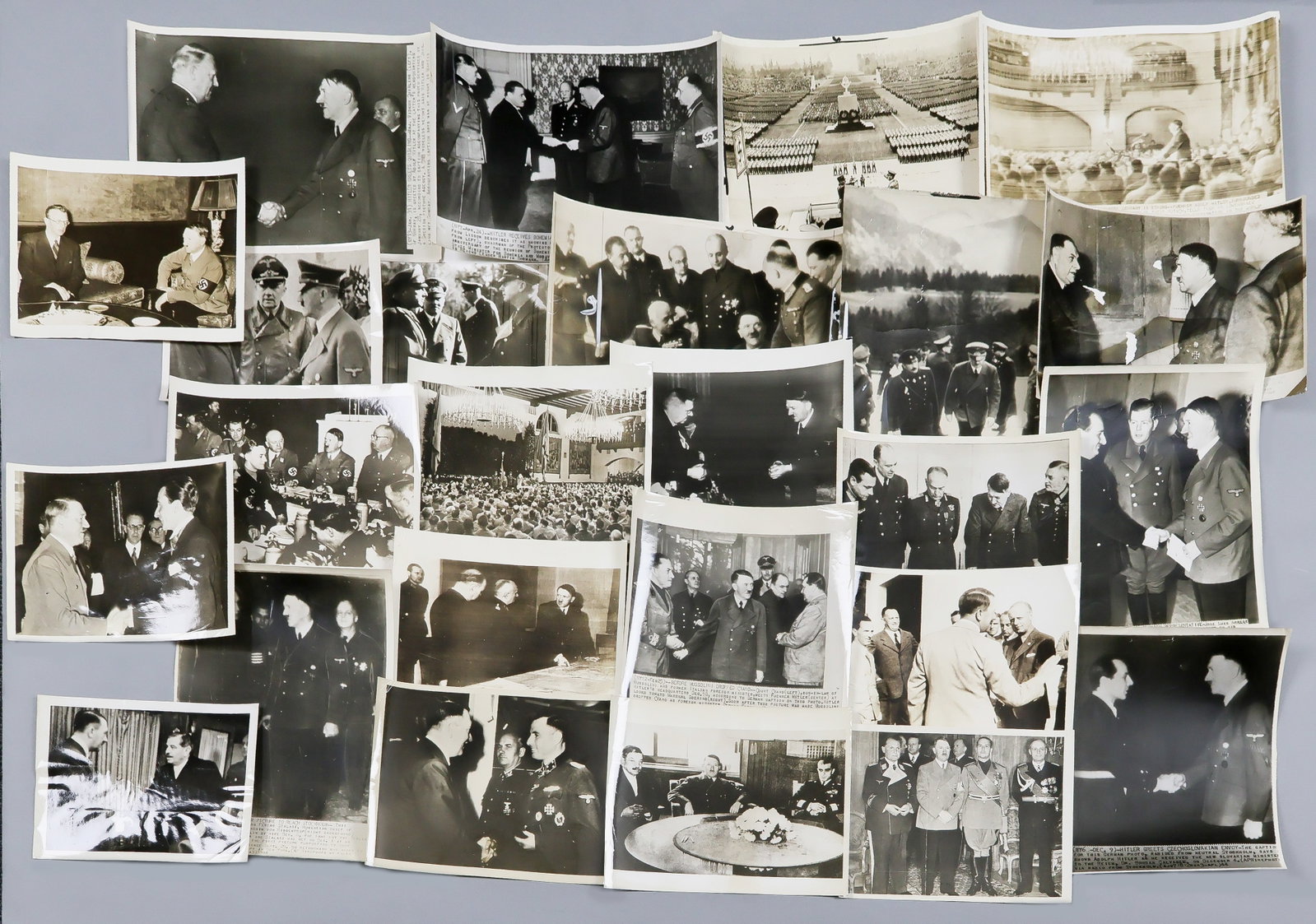ADOLF HITLER (25): Good lot of 25 period press photographs, average size about 7 x 9 in. and the great majority with period date and/or press affiliation ink stamps on verso, a good representative selection of varying