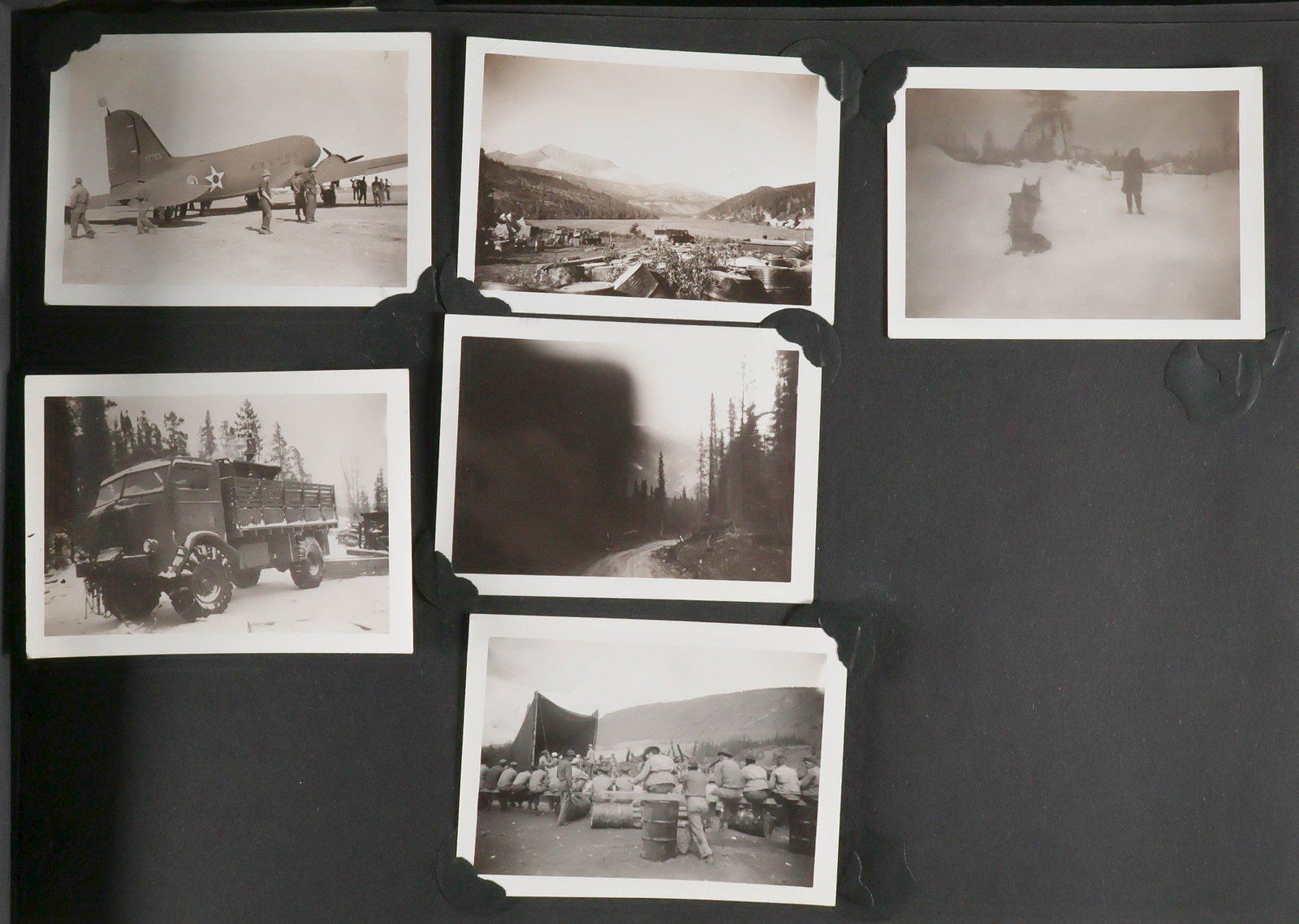 ALASKA-CANADA (ALCAN) HIGHWAY CONSTRUCTION PHOTO ALBUM: A rare and extensive photograph album detailing the construction of the 1,500 mile-long Alcan Highway. The Alaska Highway (Alcan) was built in 1942 in just eight months to connect Alaska with Canada