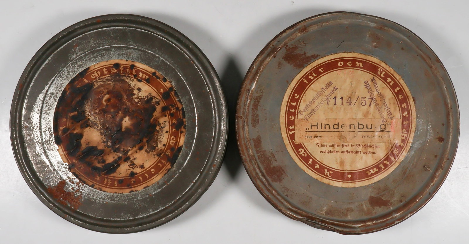 GERMAN FILM NEWSREELS (2): Pair of original German 16mm. newsreels films in original canisters, all issued by the Reich Office for Educational Films ( RfdU ), the topics concerning the 1936 Olympics and Chancellor Paul von