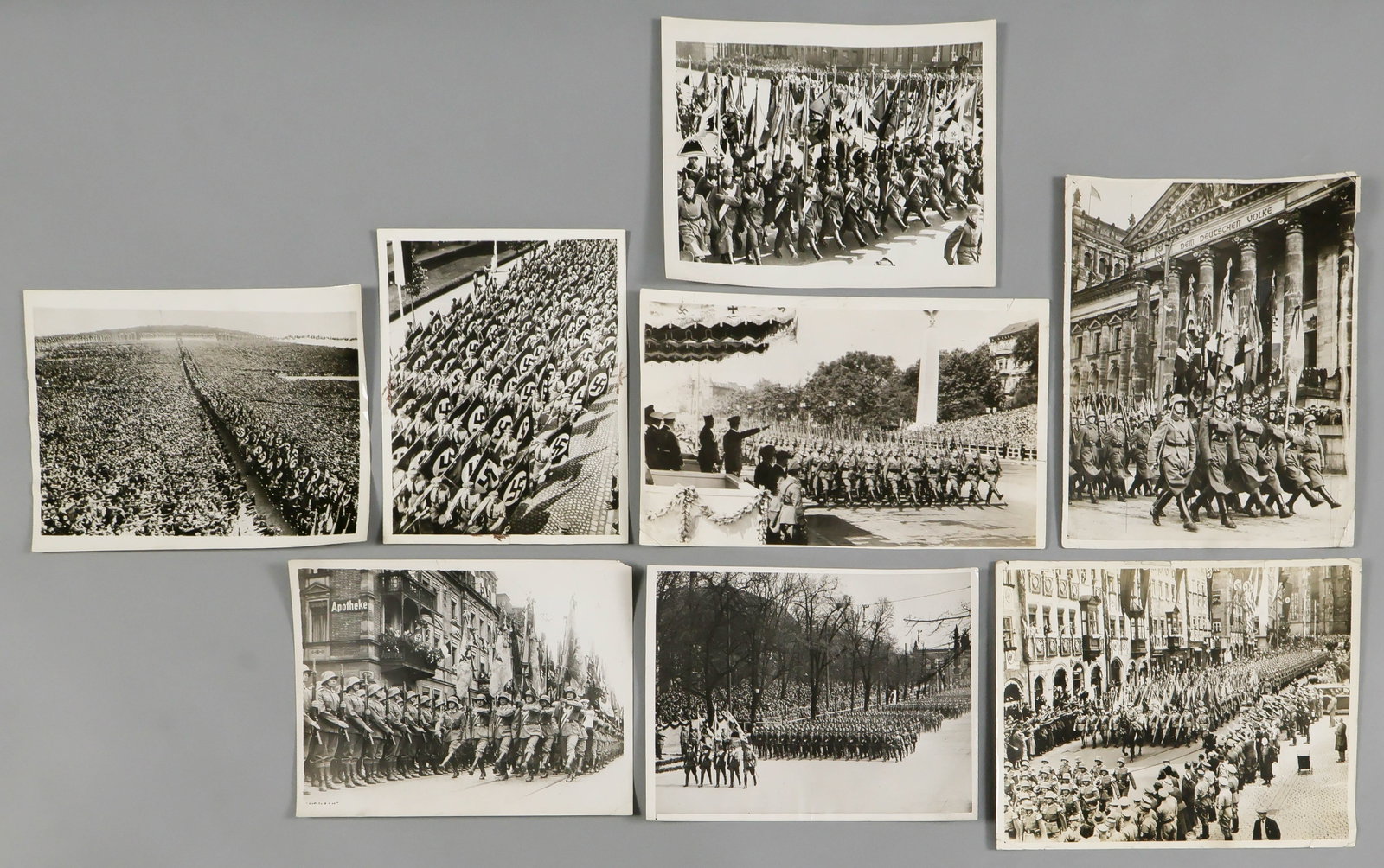 GERMAN SOLDIERS PARADE (8): Lot of eight period, original American press photographs, 7 x 9 in. or larger, all portraying large pre-war parades by German soldiers displaying war banners, NSDAP flags, etc., at least two of the pa