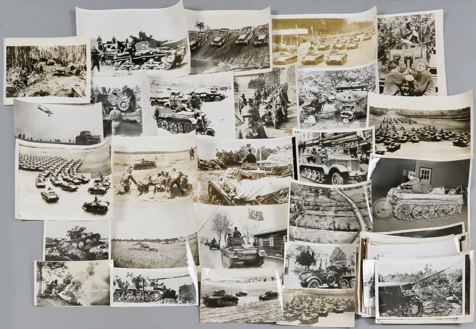 GERMAN TANKS AND ARMOR (50+): Superior, large lot of over fifty period, original American press photo of almost exclusively German tanks with a few examples of other German armored vehicles included. Most of the photographs