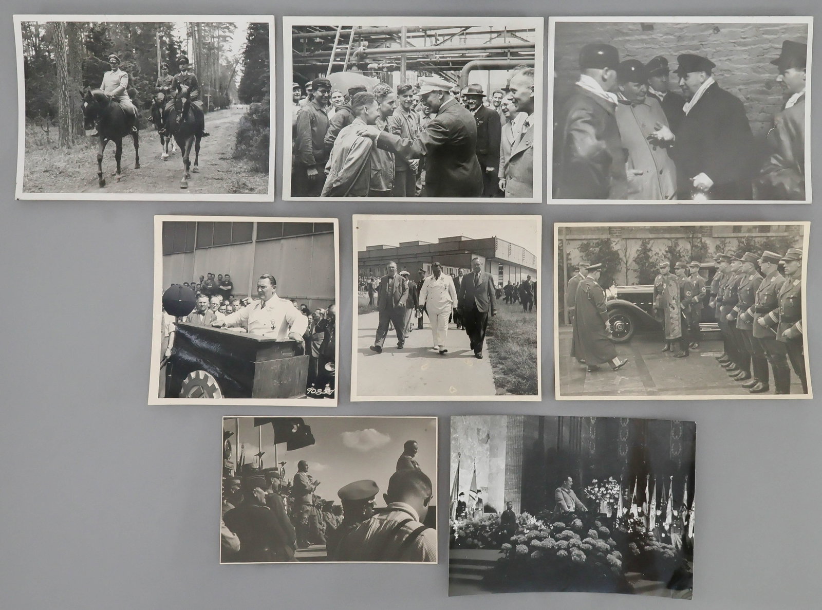 HERMANN GORING (8): Great lot of original Type One photographs, unpublished with one from Goring's personal photo archive, showing Hermann Goring in a variety of settings. The Reischsmarshall is shown on horseback, at