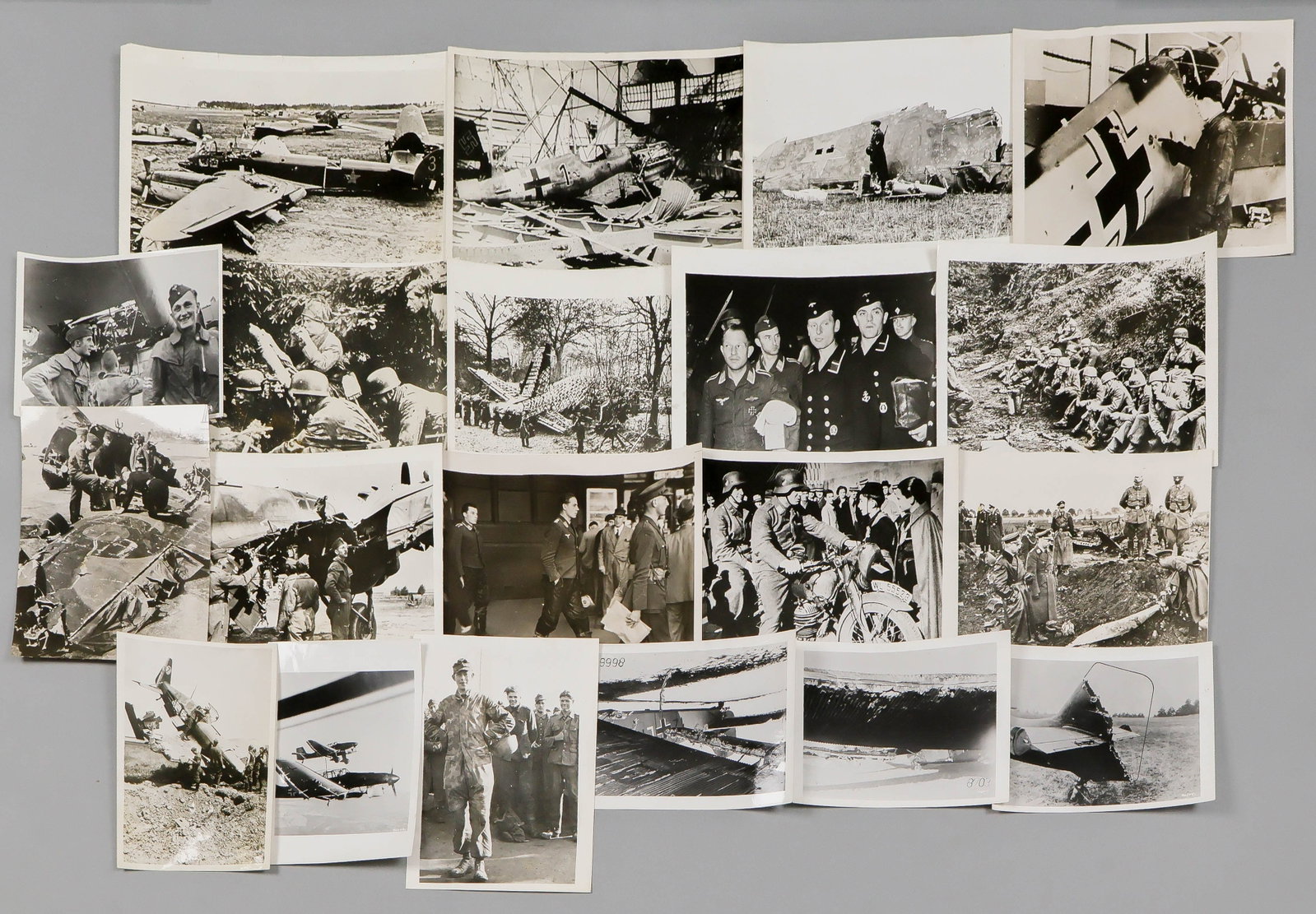 LUFTWAFFE AND FALLSCHIRMJAGER PHOTOGRAPH GROUPING (20): Lot of 20 original and contemporary press photographs, virtually all with stamped press attributions, dates, and printed captions on versos, a large variety of views including Fallschirmjager troops