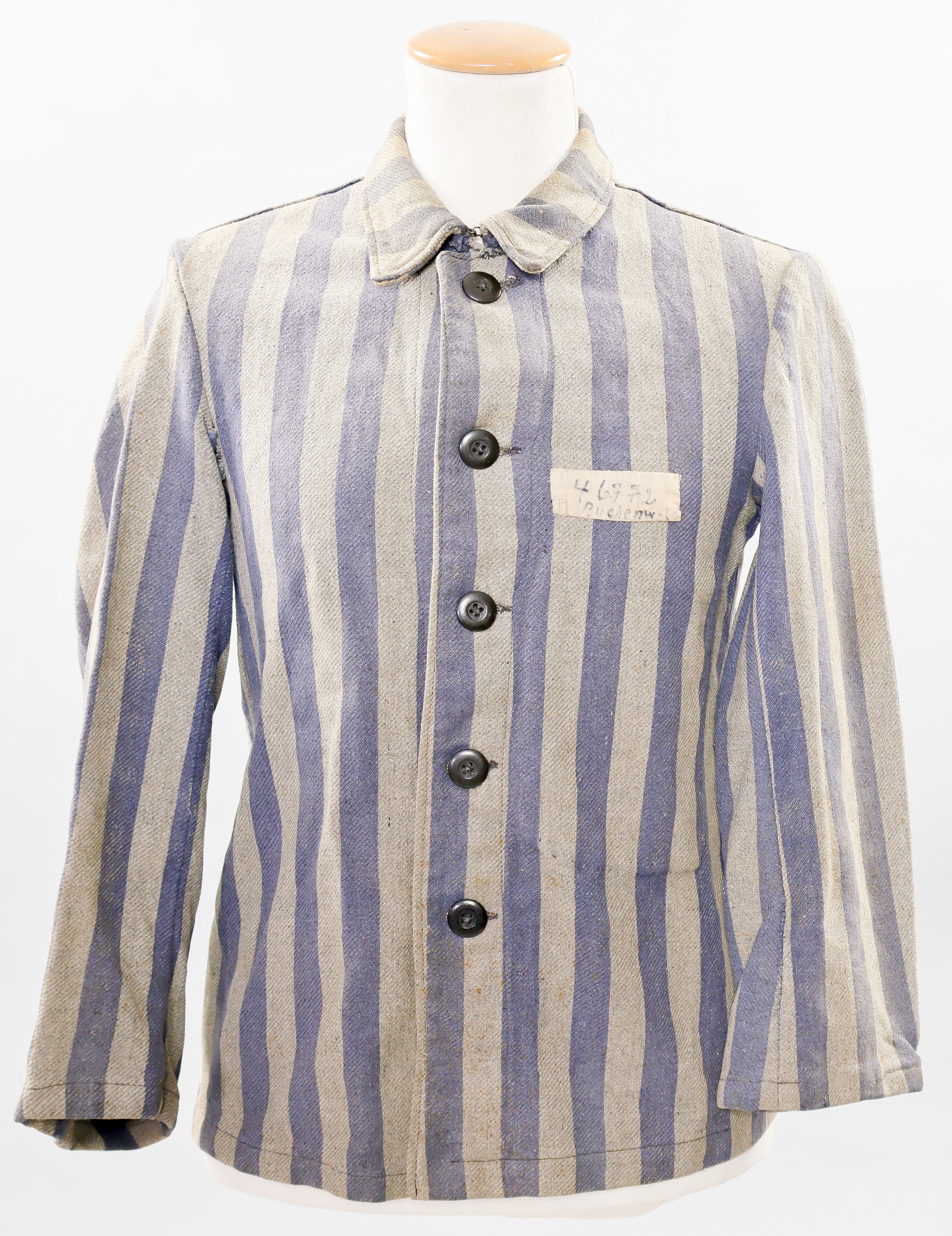 BUCHENWALD CAMP PRISONER'S JACKET, IDENTIFIED: An especially rare and unquestionably genuine Buchenwald KZ-lager prisoner's jacket, once the property of Lothar Reigmann, born Mar. 27, 1917, Buchenwald inmate No. 46772 and coded 'BV' or 'Berufsverb