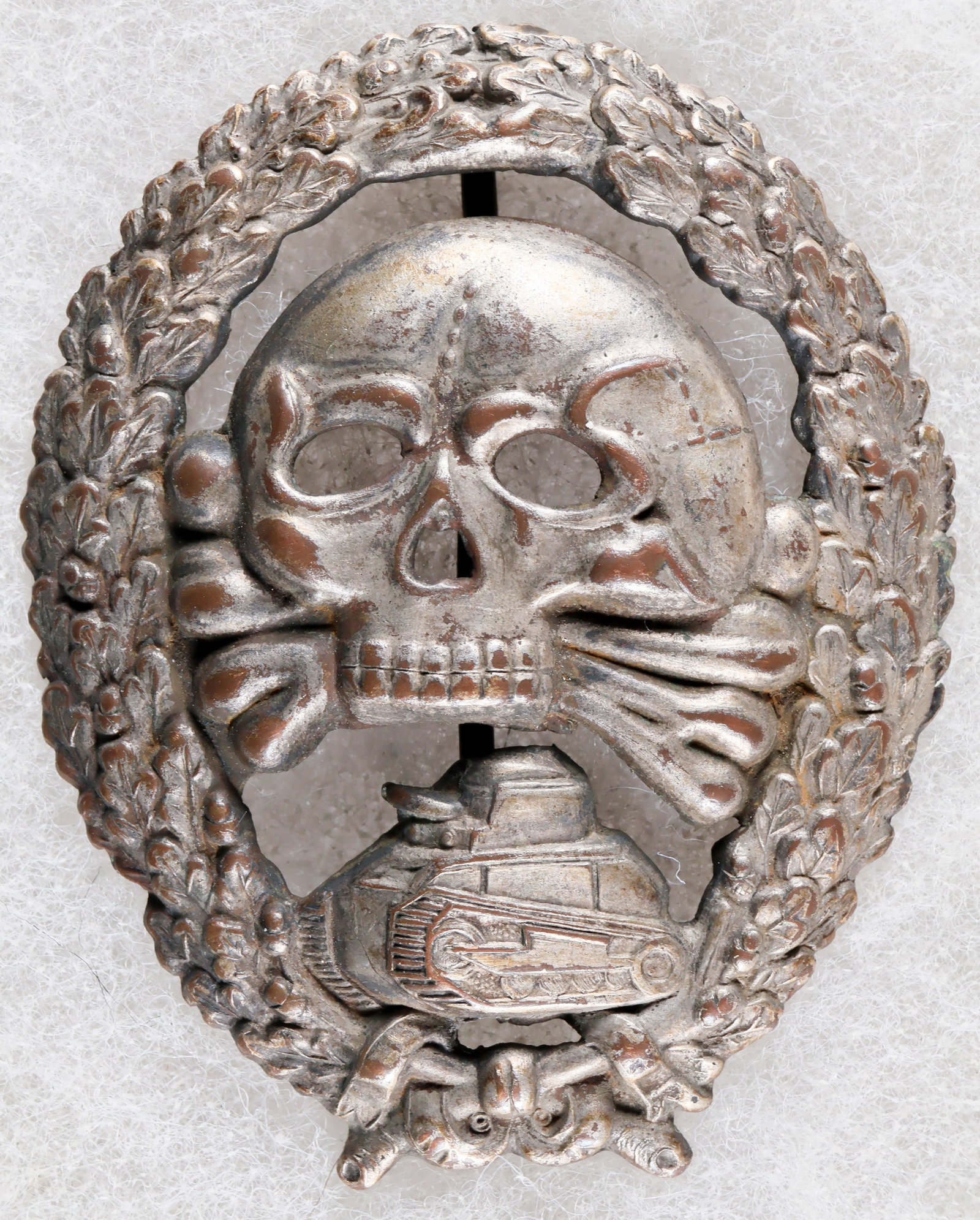 CONDOR LEGION TANK BADGE (POST-WAR): A German ‘Panzertruppenabzeichen der Legion Condor’, or Condor Legion Panzer Troops Tank Badge, approx. 2 x 1.75 in., awarded to tank crews who participated in the Spanish Civil War. The
