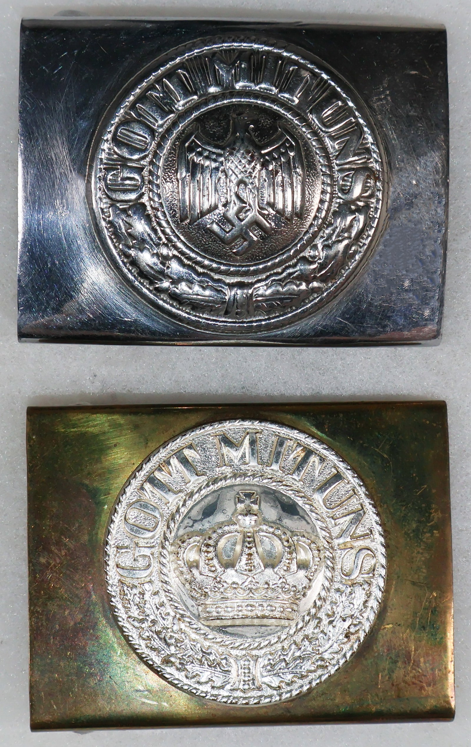 GERMAN PARADE-USE BELT BUCKLES (2): Pair of beautiful, high-quality German army bely buckles for use in parades and other very visible functions, includes a World War I brass and silver 'GOTT MIT UNS' example, sold with a World War II
