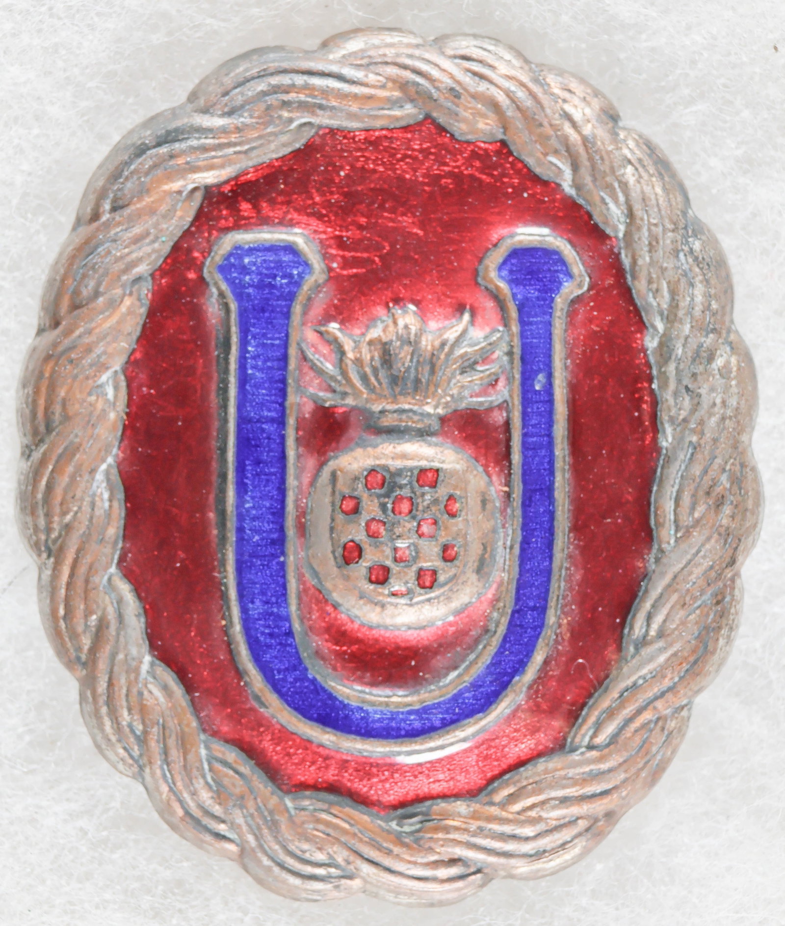 INDEPENDENT STATE OF CROATIA USTASE OFFICER'S BELT BUCKLE: Rare World War II-era belt buckle, 1.75 x 2.25 in., worn by officers of the Ustase, the ruling party of the Independent State of Croatia. The oval buckle is constructed of silvered tombac,