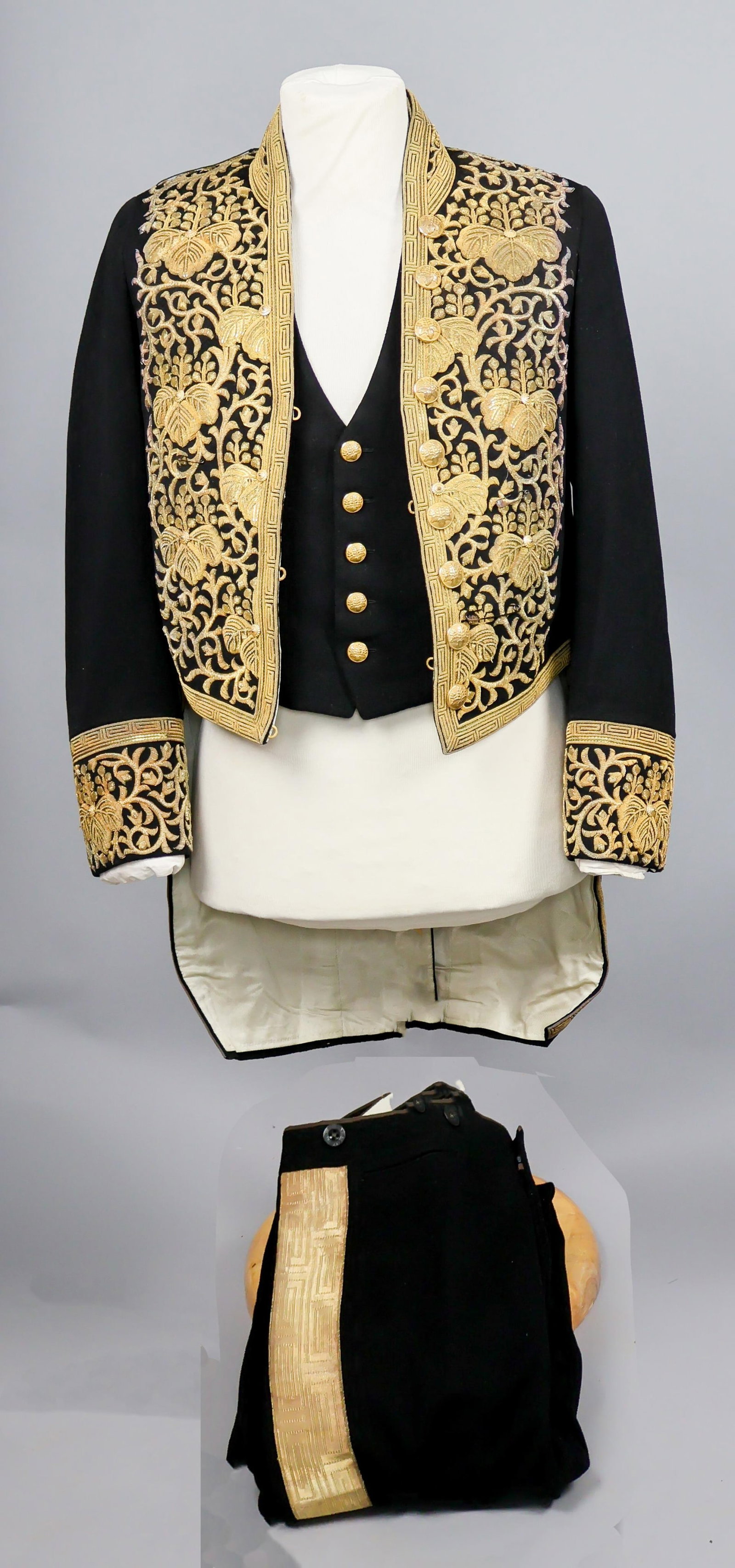 JAPANESE AMBASSADOR'S DRESS UNIFORM AND SWORD, WITH LEATHER CASE: A fantastic Japanese ambassador's formal dress uniform and sword, attributed to Japanese Foreign Minister KATSUMI ONO (1905-2006). Ono entered the Japanese Ministry of Foreign Affairs in 1929. From 19