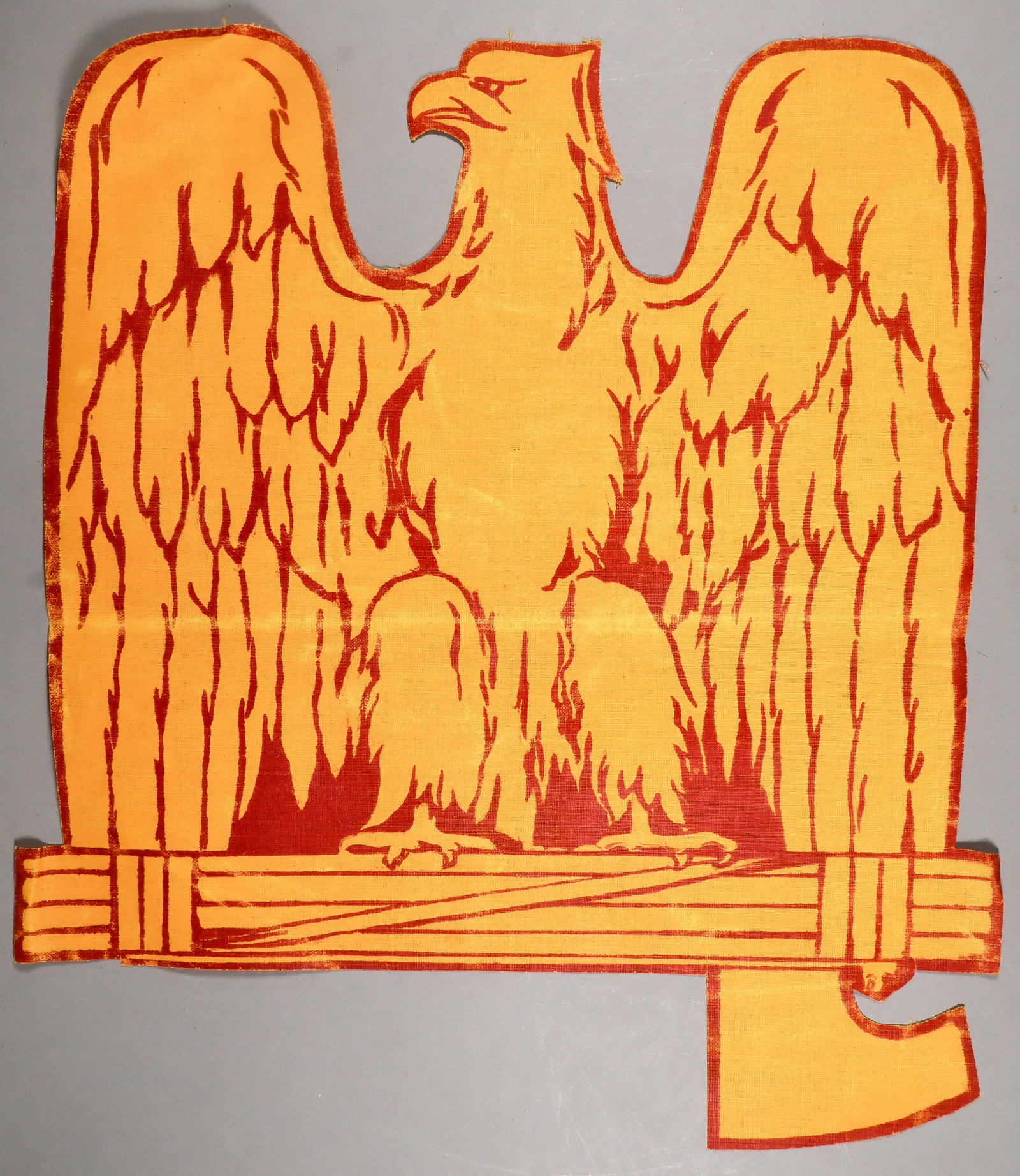 ITALIAN BLACKSHIRTS MILITIA EAGLE FLAG INSIGNIA: A scarce fascist Italian flag or banner insignia, approx. 13 in. x 14.5, constructed of doped cloth and depicting a printed eagle clutching a fasces, the insignia of the ‘Milizia Volontaria per