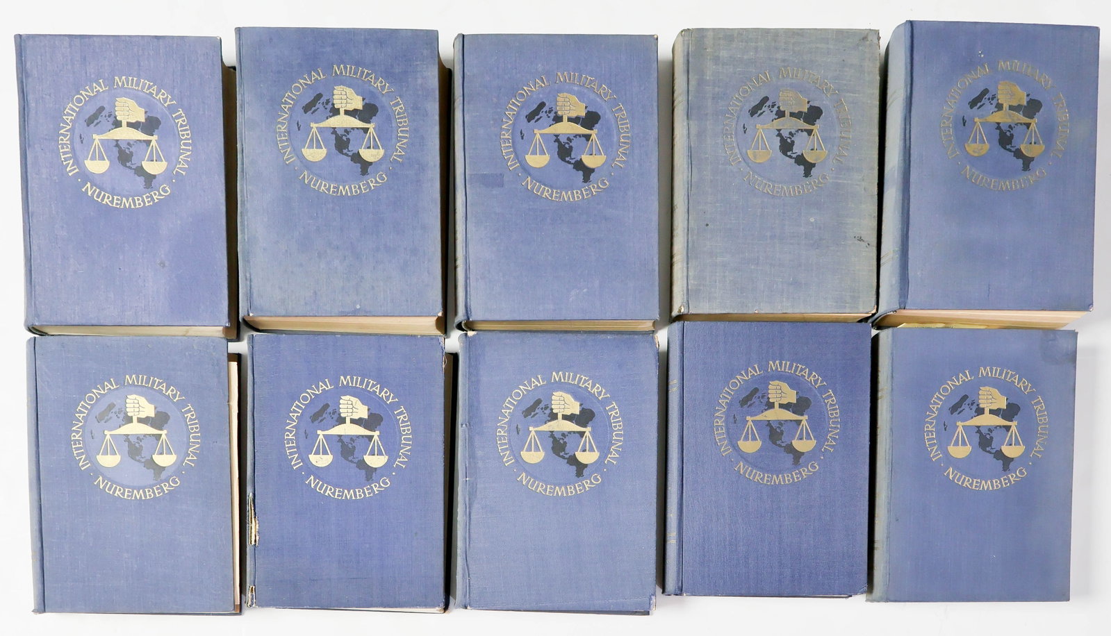 INTERNATIONAL MILITARY TRIBUNAL PROCEEDINGS (18): Collection of 18 volumes of a series of officially published books outlining the full proceedings of the first round of trials under the jurisdiction of the International Military Tribunal. These