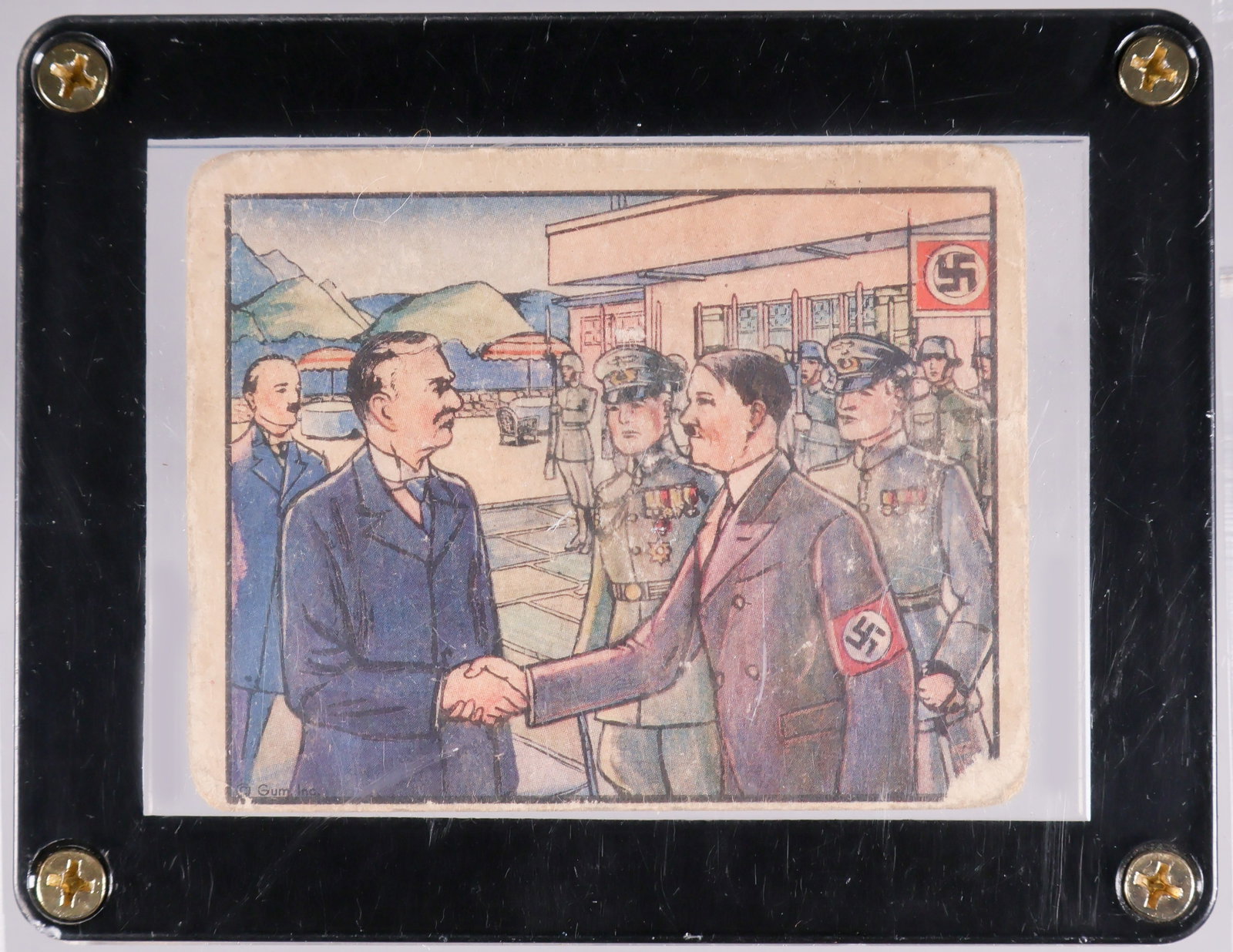 NEVILLE CHAMBERLAIN MEETS ADOLF HITLER ‘HORRORS OF WAR’ TRADING CARD: A rare trading card, ‘Chamberlain Meets Hitler in Peace Effort’, No. 286 of the ‘Horrors of War’ series published in 1938 by Gum, Inc. of Philadelphia. The card features an ill