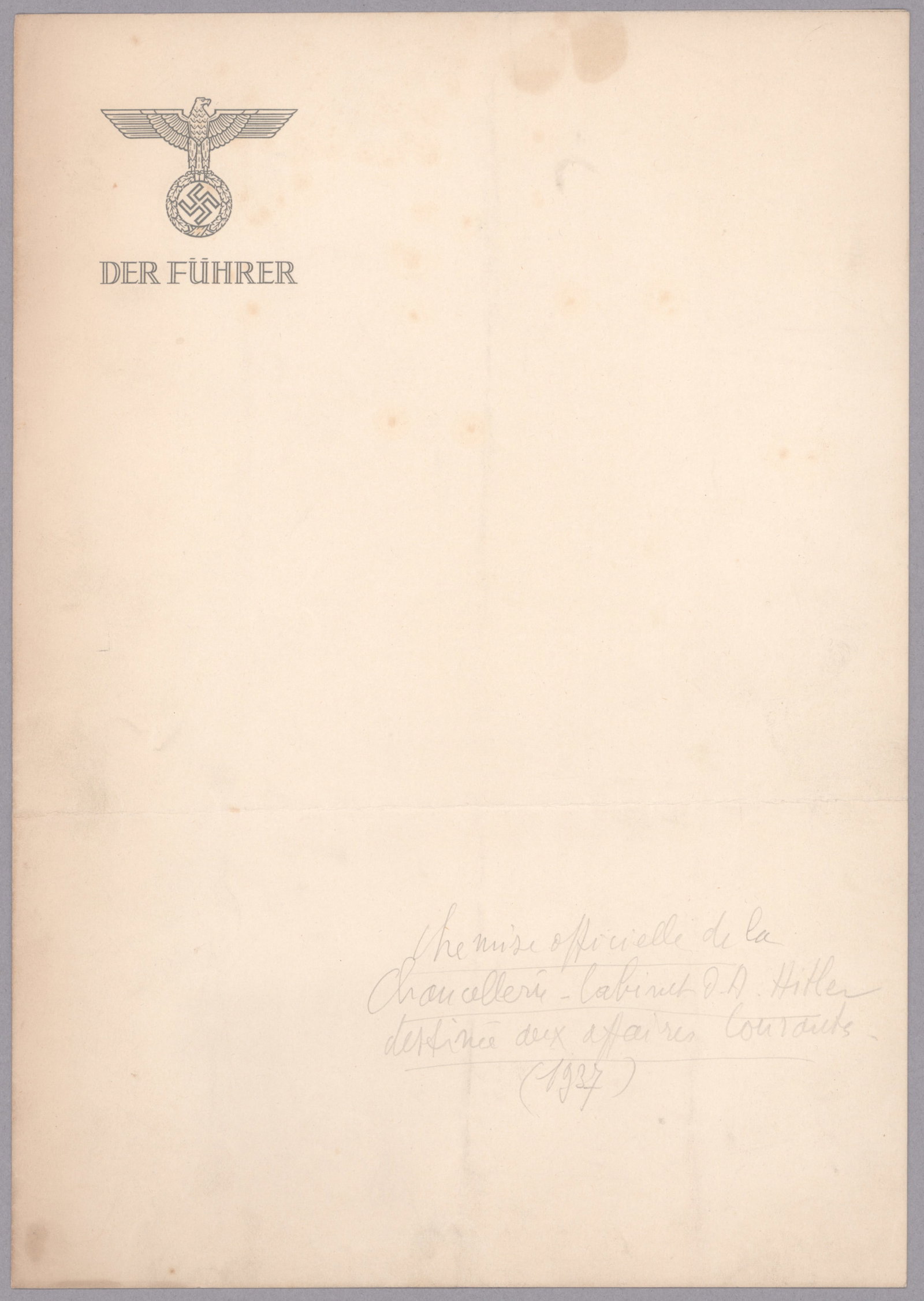 ADOLF HITLER PERSONAL LETTERHEAD: An original sheet of Hitler's personal letterhead, folded legal folio size with printed NSDAP eagle and ‘Der Fuhrer' at top left. Very right pencil note in French at bottom right, easily erased,