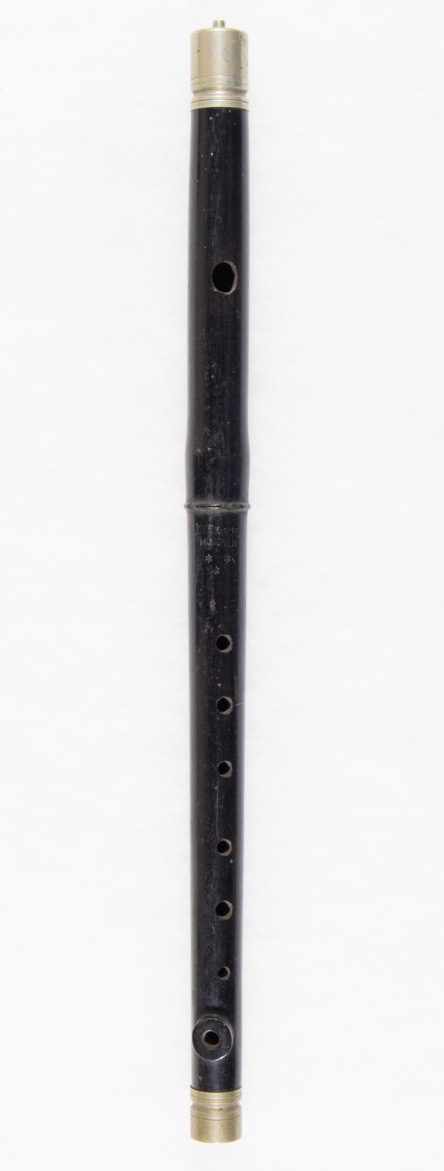 GERMAN FIFE WITH CASE: Scarce original manufacture German rosewood fife, 15 in. long, and leather case. The black leather belt case is maker marked and dated on the reverse of the belt loop: ‘OTTO SINDEL BERLIN