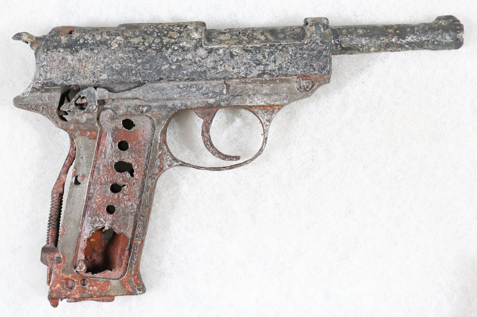 GERMAN LUGER RECOVERED IN THE ARDENNES FOREST, BELGIUM: Metal frame of a 9mm German Luger pistol dug in the Ardennes Forest in the general vicinity of Flamierge, just northwest of Bastogne (per our consignor, a long time collector) and also the scene of