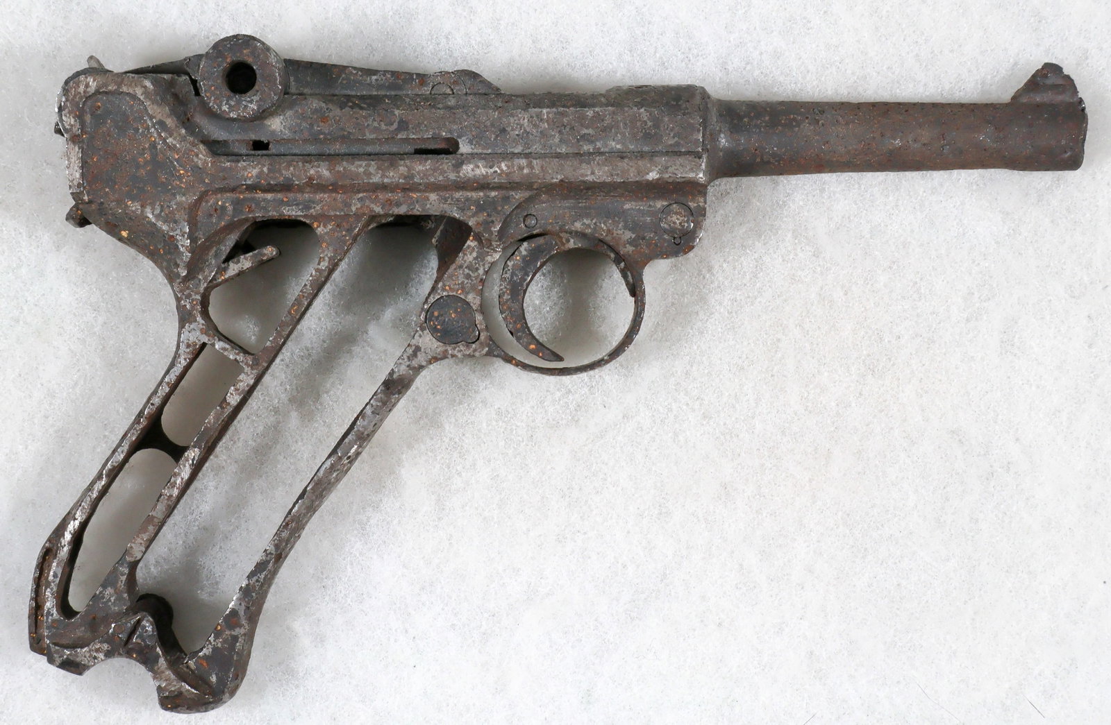 GERMAN LUGER RECOVERED IN THE ARDENNES FOREST, BELGIUM: Metal frame of a 9mm German Walther P38 pistol dug in the Ardennes Forest in the general vicinity of Flamierge, just northwest of Bastogne (per our consignor, a long time collector) and also the
