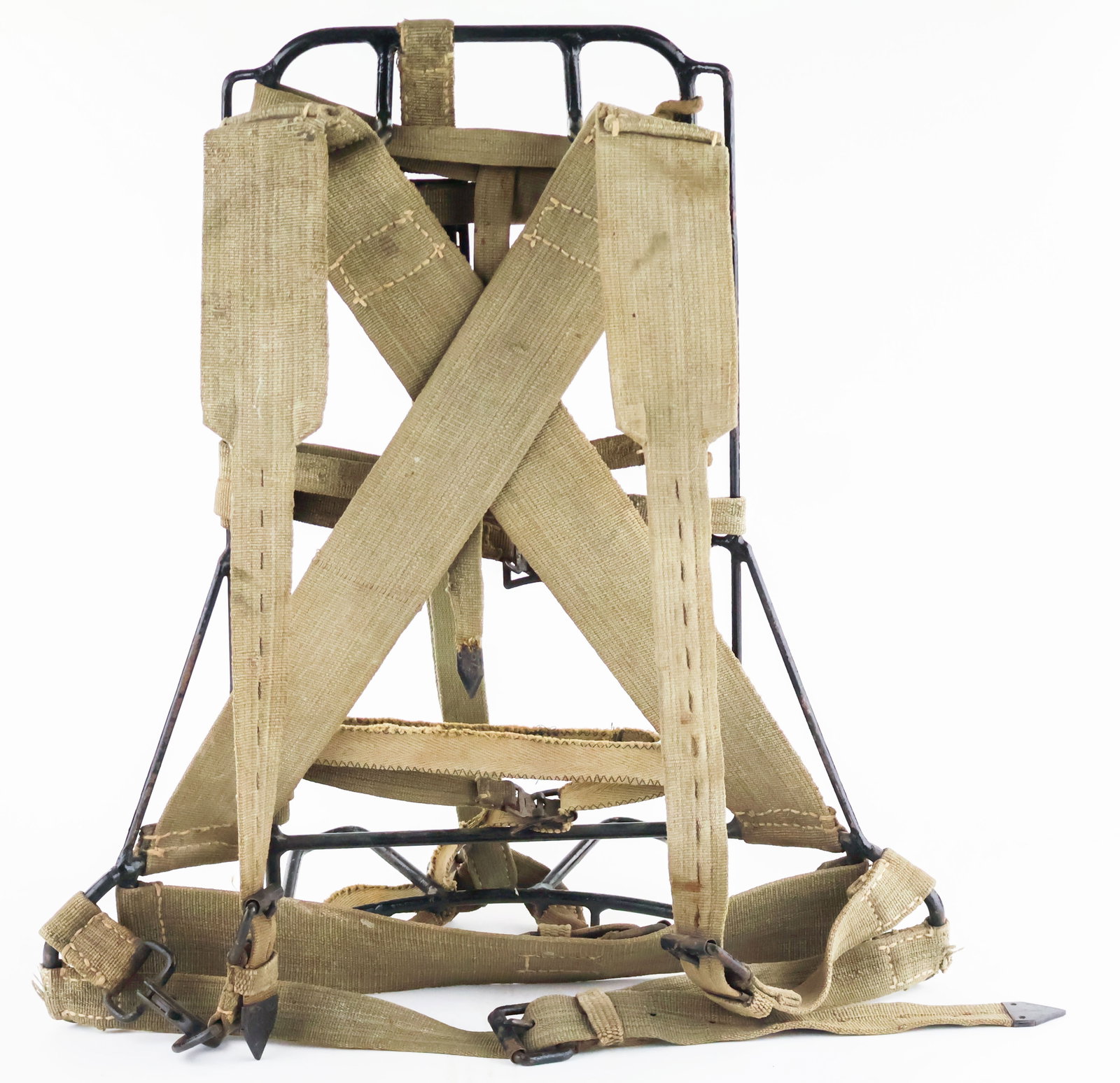 GERMAN M-39 PACK FRAME: A well-preserved heavy canvas M/39 pack frame, 10.5 in x 10 in., used in conjunction with the M31 metal A-frame, composed of a tubular steel frame with the original black factory paint. All of the