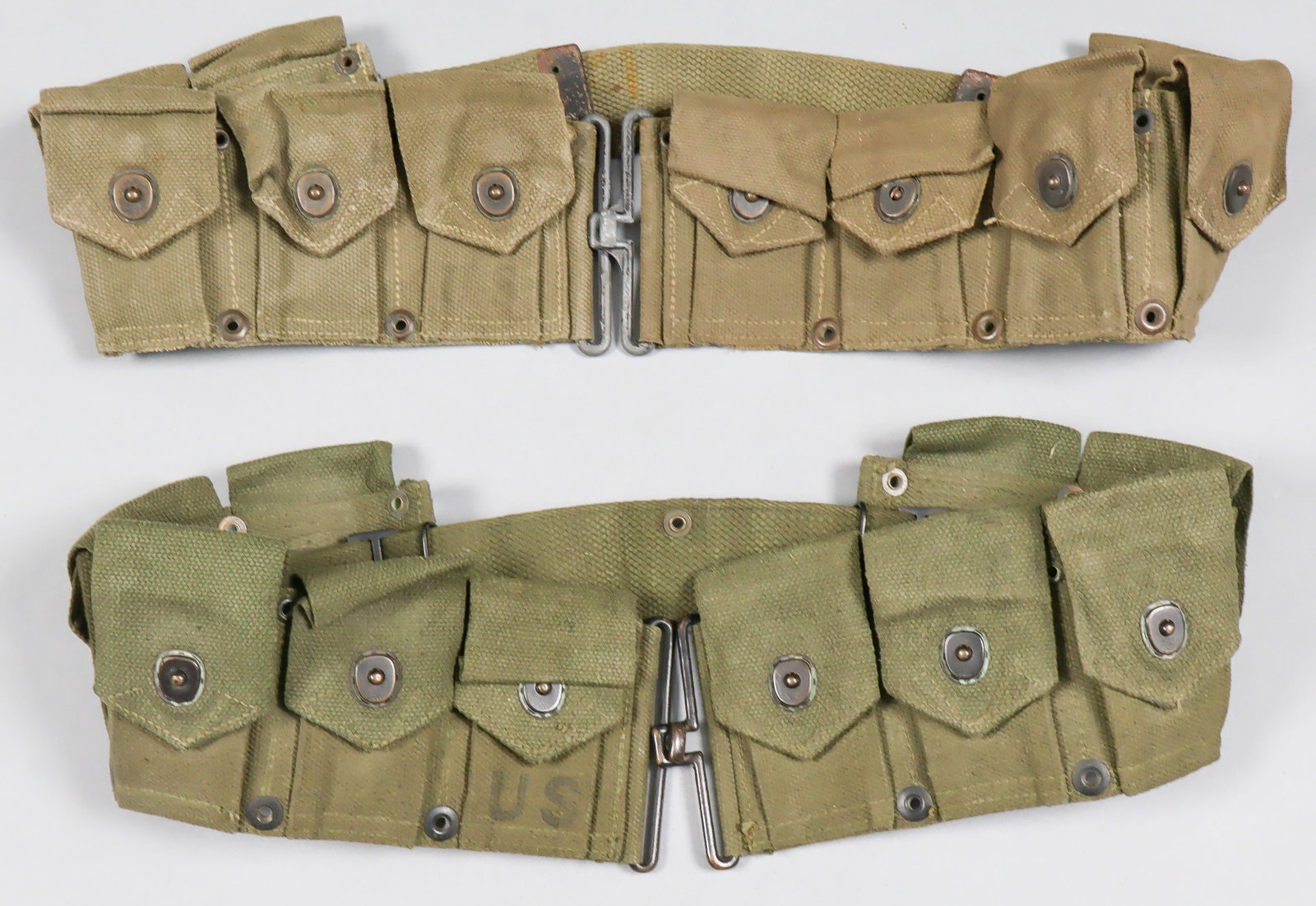 M1923 CARTRIDGE BELTS (2): A good pair of interwar U.S. M1923 cartridge belts for the .30-06 ammunition used by the Springfield M1903 and the M1917 rifles, and later the en-bloc clips used with the M1 Garand. Includes: M1923