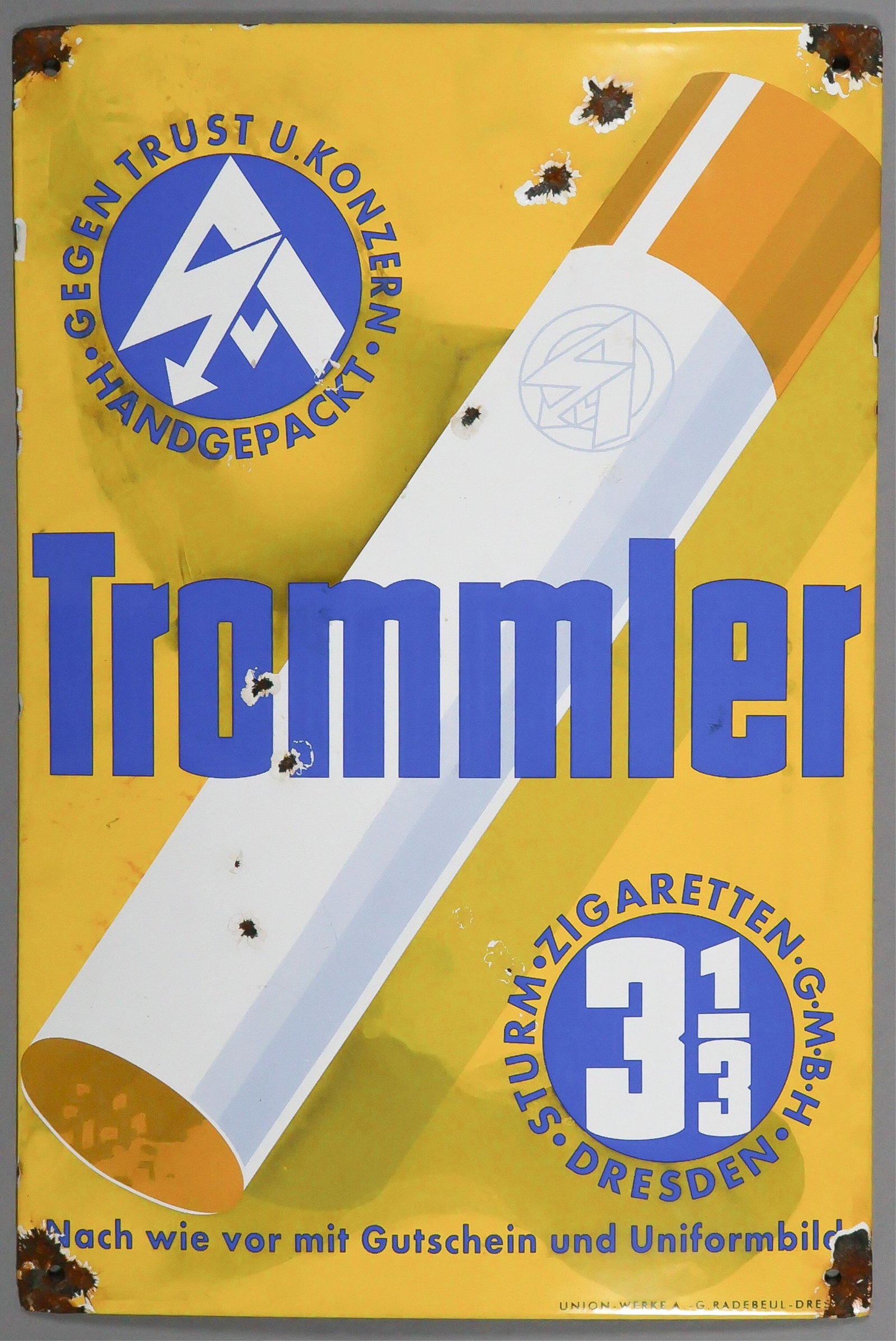 NAZI S.A. CIGARETTE ADVERTISING SIGN: German porcelain sign advertising ‘Trommler’ cigarettes, , 8 in. x 11.75 in., manufactured by ‘STORM CIGARETTES GMBH’ of Dresden, a front group engaged in fund raising for the